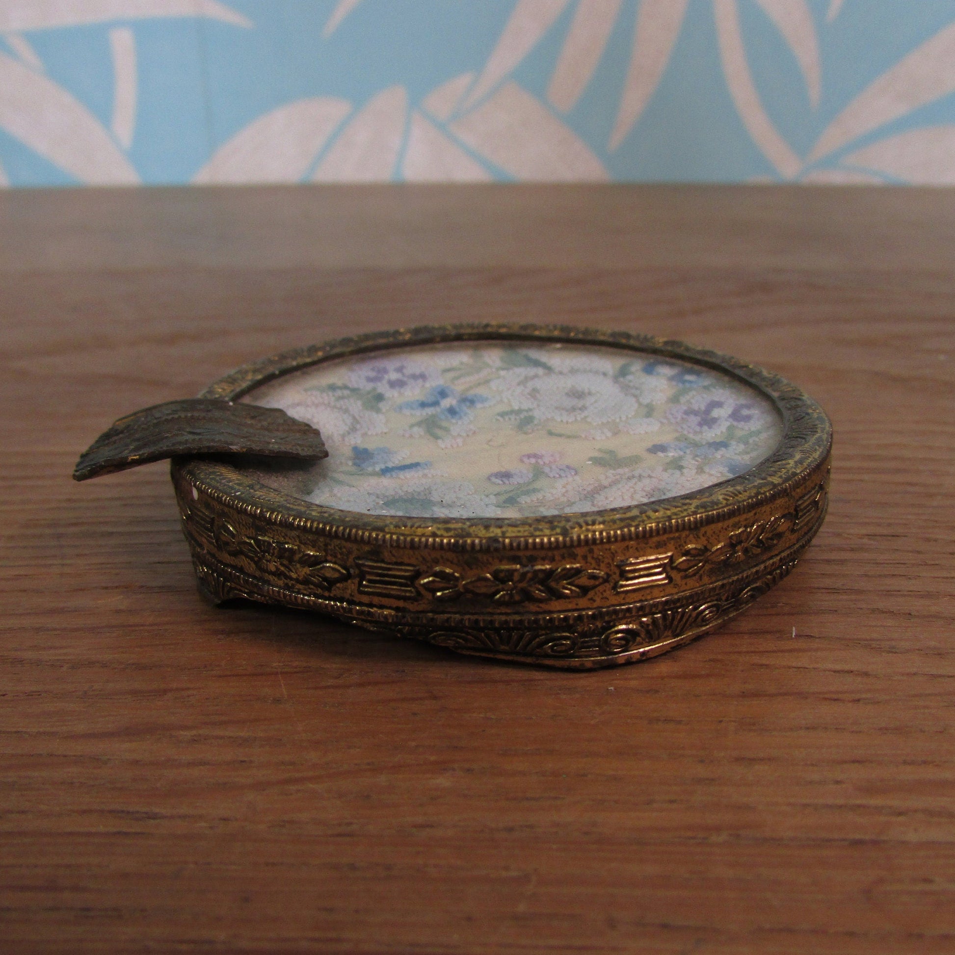 Vintage gilt metal & glass ladies ashtray with delicate petit point embroidery detail