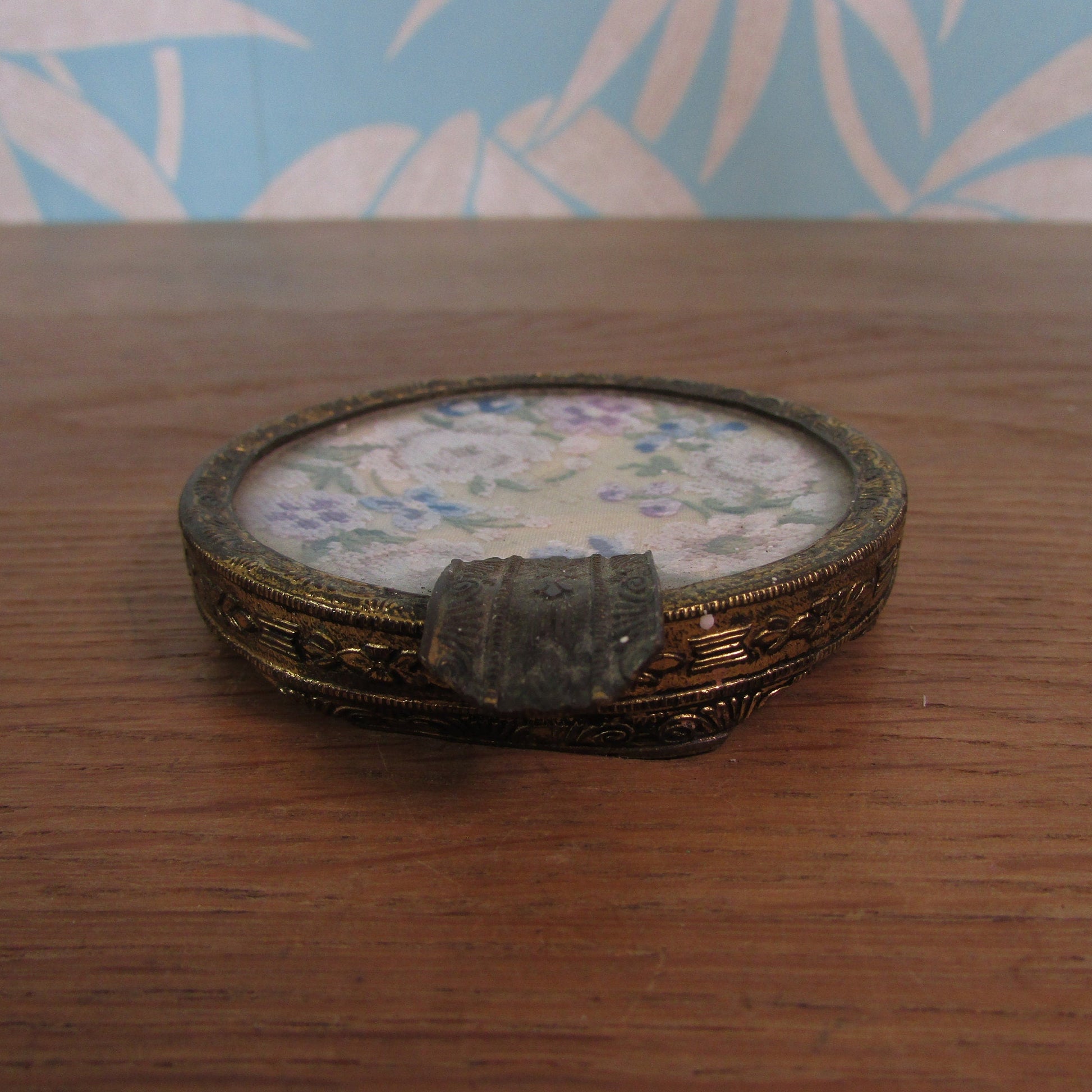 Vintage gilt metal & glass ladies ashtray with delicate petit point embroidery detail