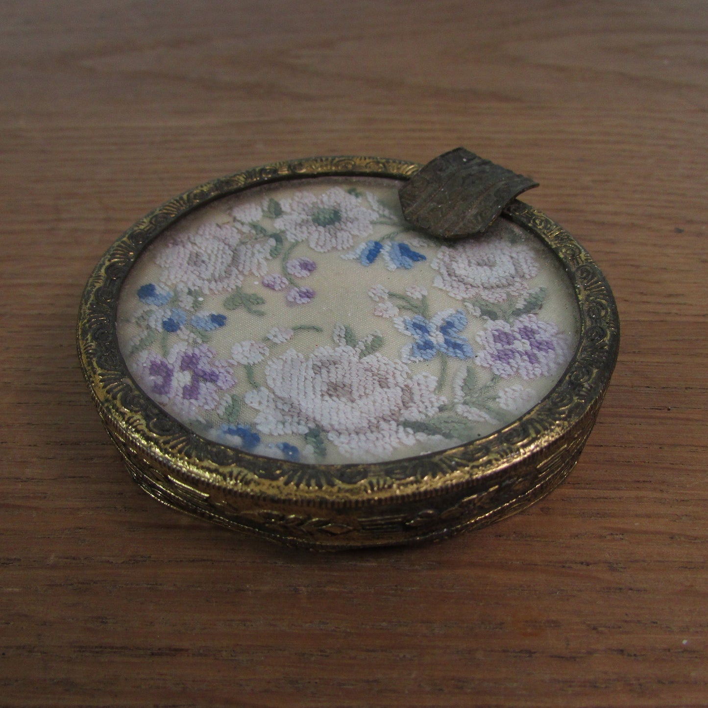 Vintage gilt metal & glass ladies ashtray with delicate petit point embroidery detail