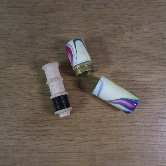 Art Deco marbled brass etui case containing wooden needle holder/thread spool