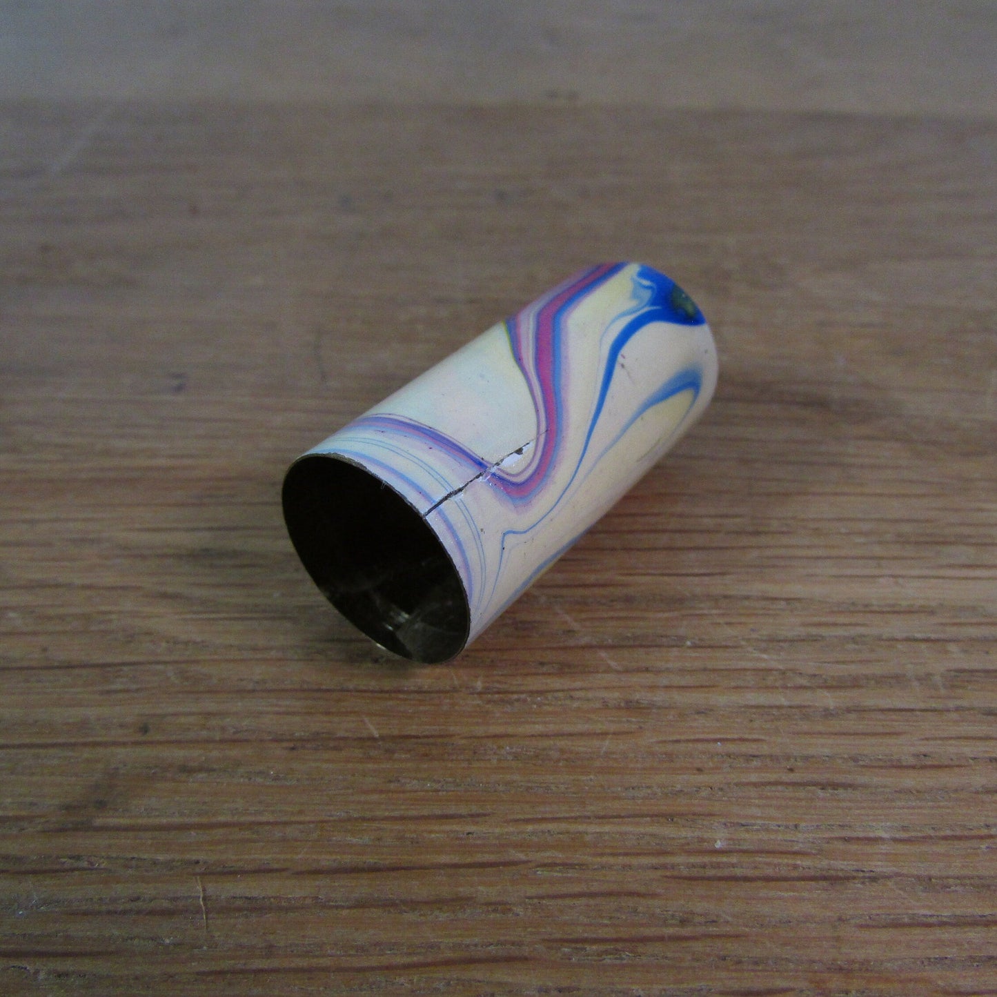 Art Deco marbled brass etui case containing wooden needle holder/thread spool