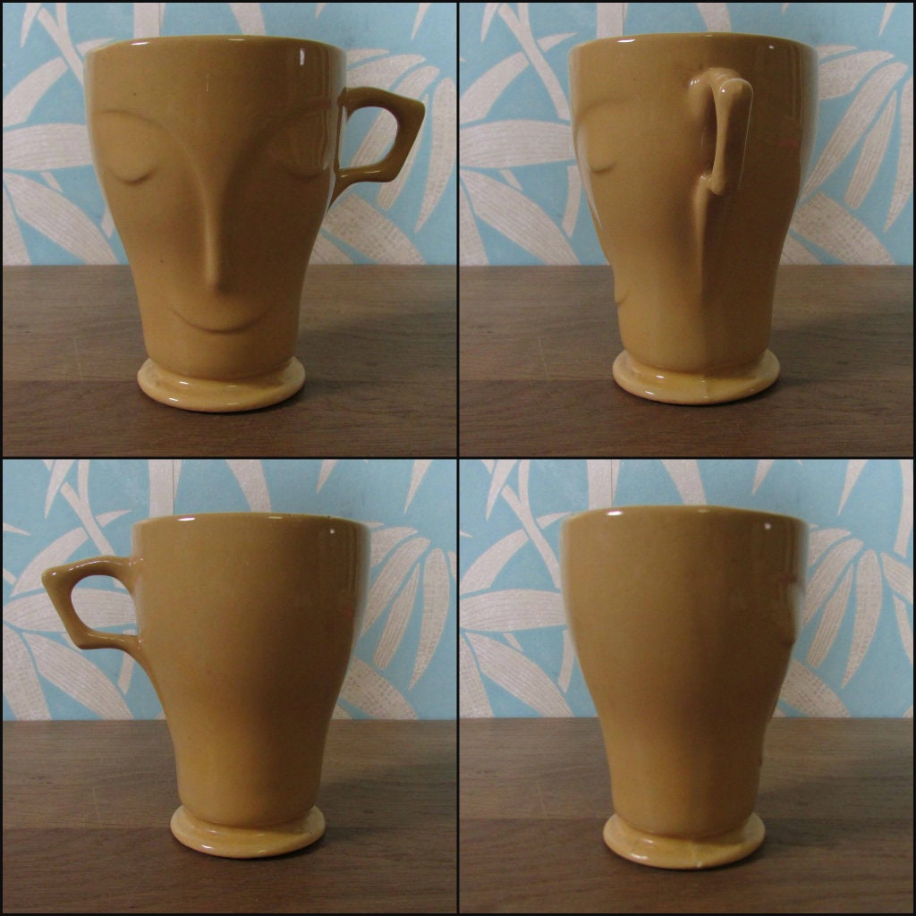 Pair of 1950s/60s collectable Cadbury's Bournville face mugs