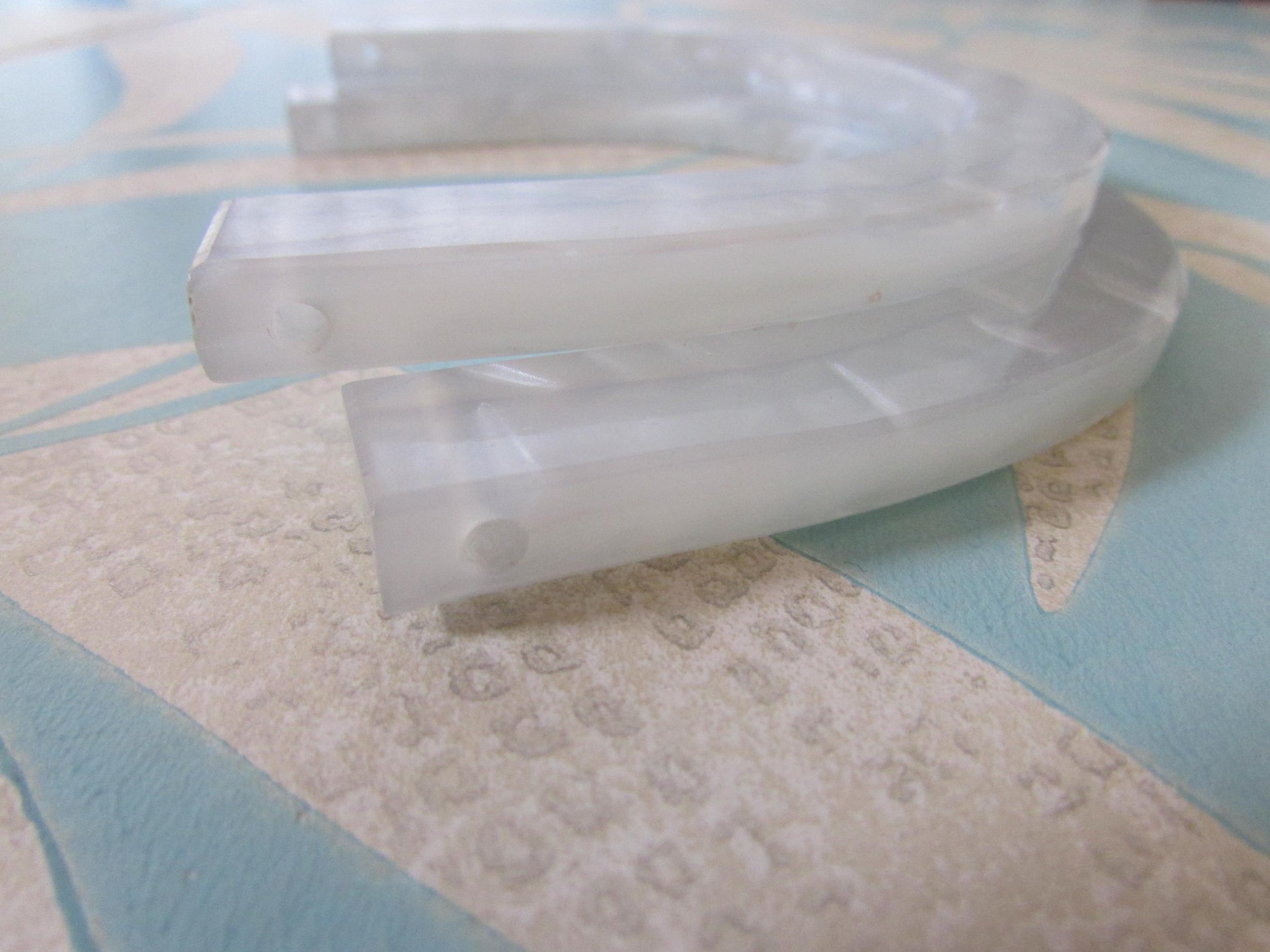 Pair of 1950s U-shaped white lucite purse/handbag handles