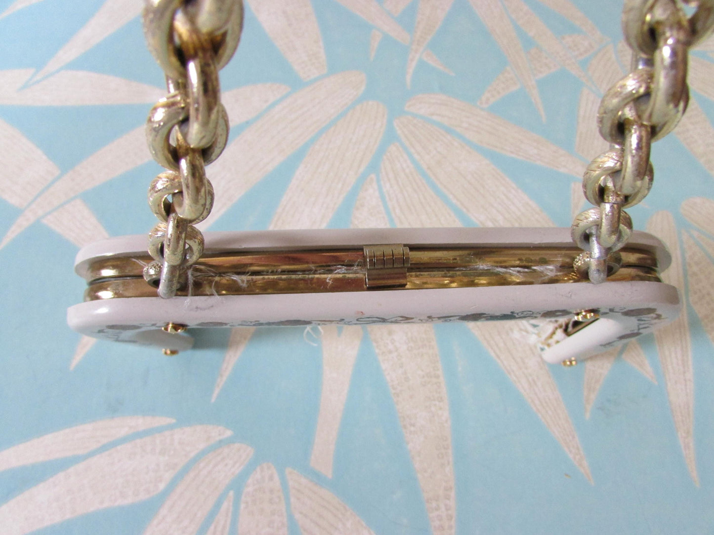 Vintage white plastic handbag/purse frame with ribbon and flower transfer detail and gold-tone chain