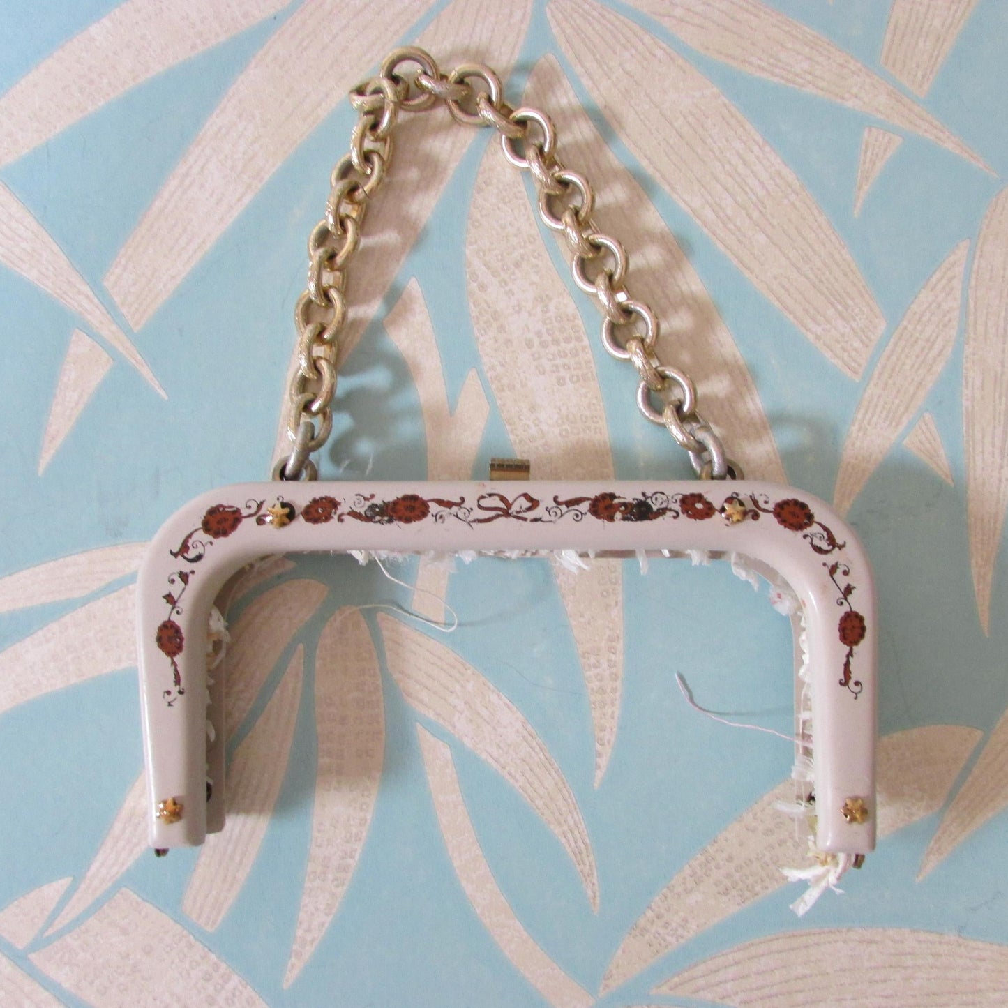 Vintage white plastic handbag/purse frame with ribbon and flower transfer detail and gold-tone chain