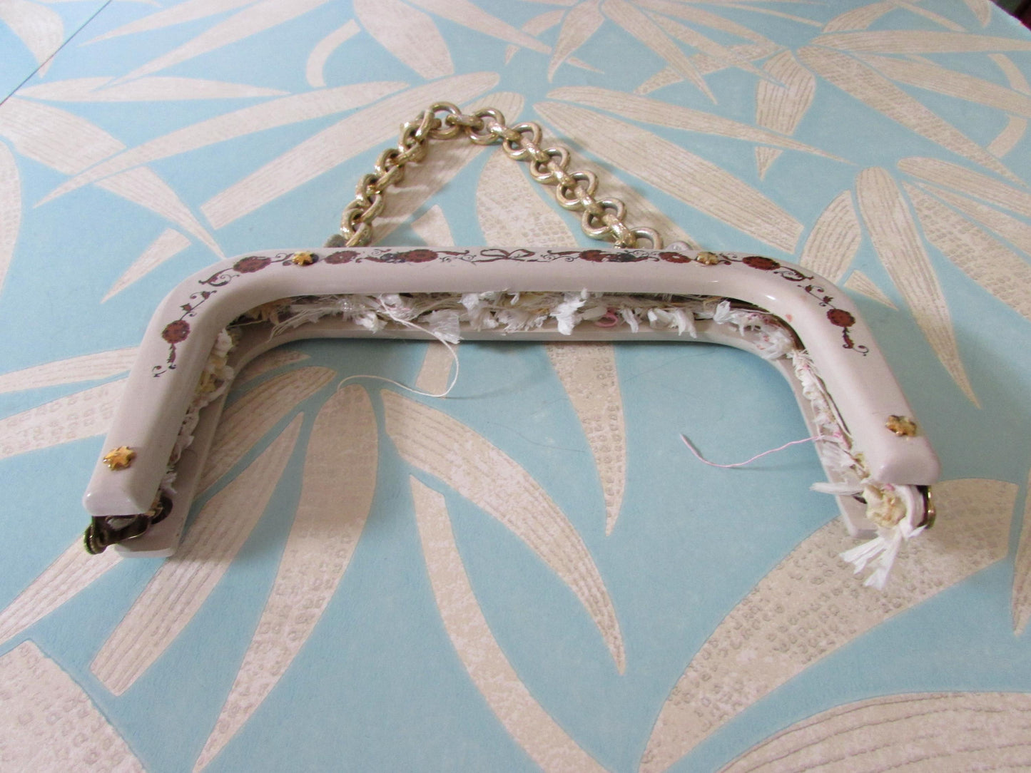 Vintage white plastic handbag/purse frame with ribbon and flower transfer detail and gold-tone chain