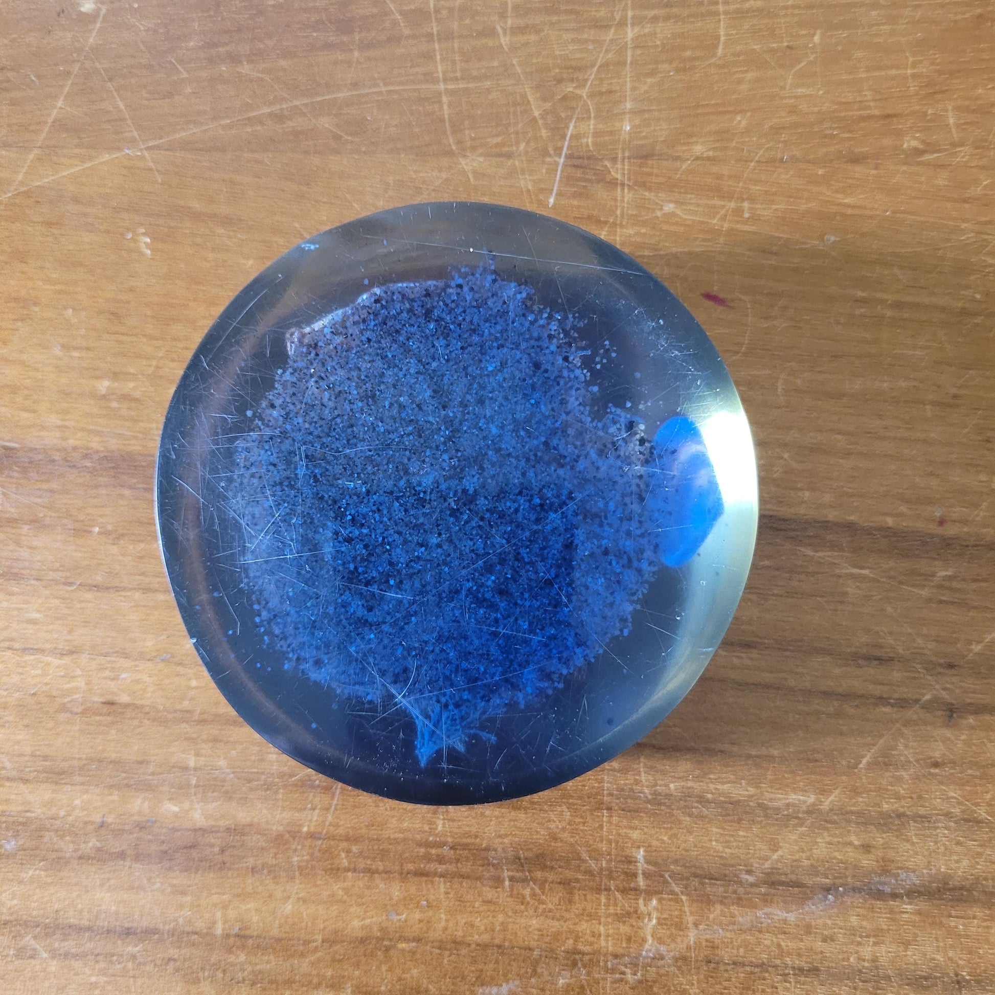 1970s 'seashore' filled resin paperweight