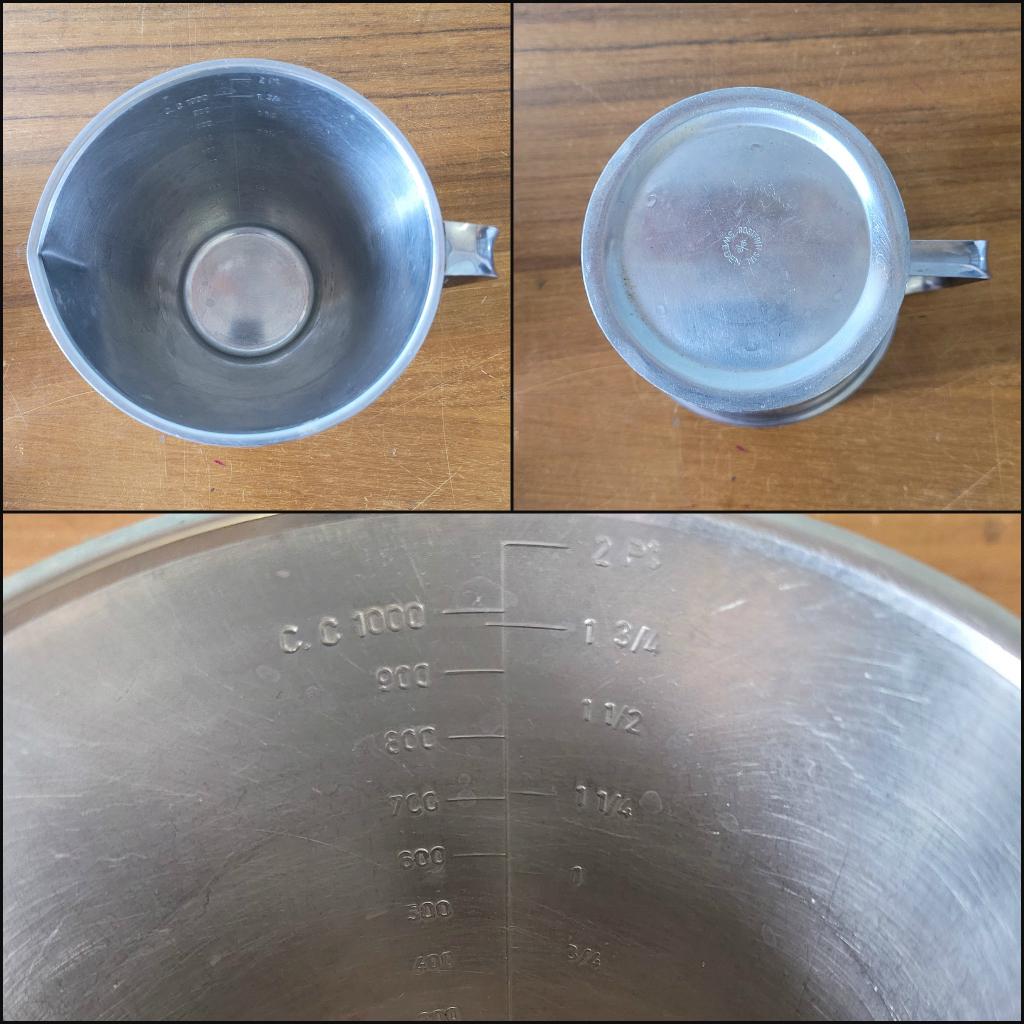 Pair of vintage Rostfritt Stal Sweden stainless steel measuring jugs