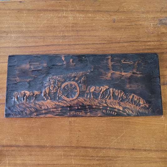 Vintage hammered copper plaque depicting La Carreta, Uruguay, signed by artist