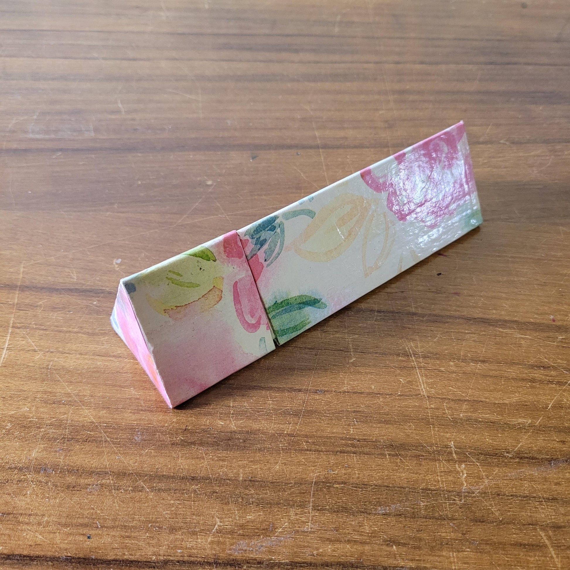 1980s Two's Company triangular floral print box containing 18 unused graphite pencils