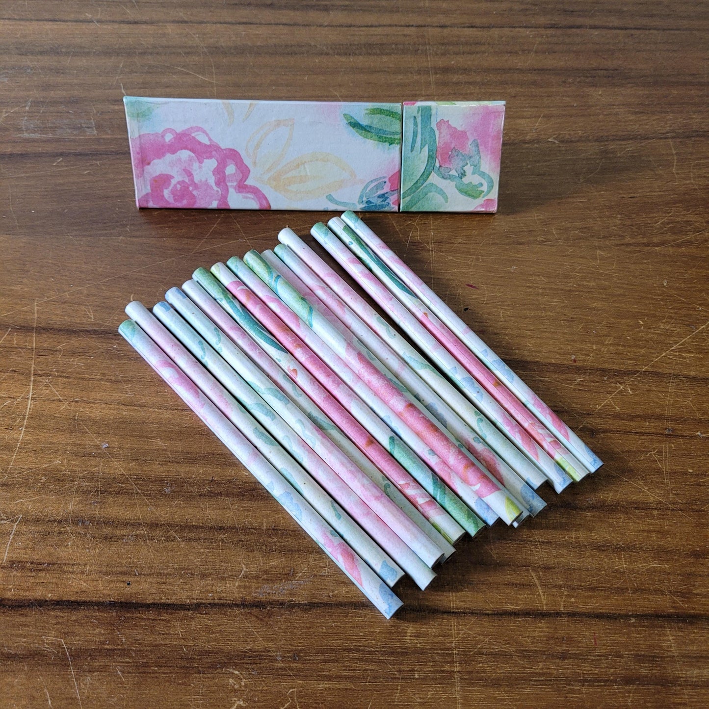 1980s Two's Company triangular floral print box containing 18 unused graphite pencils