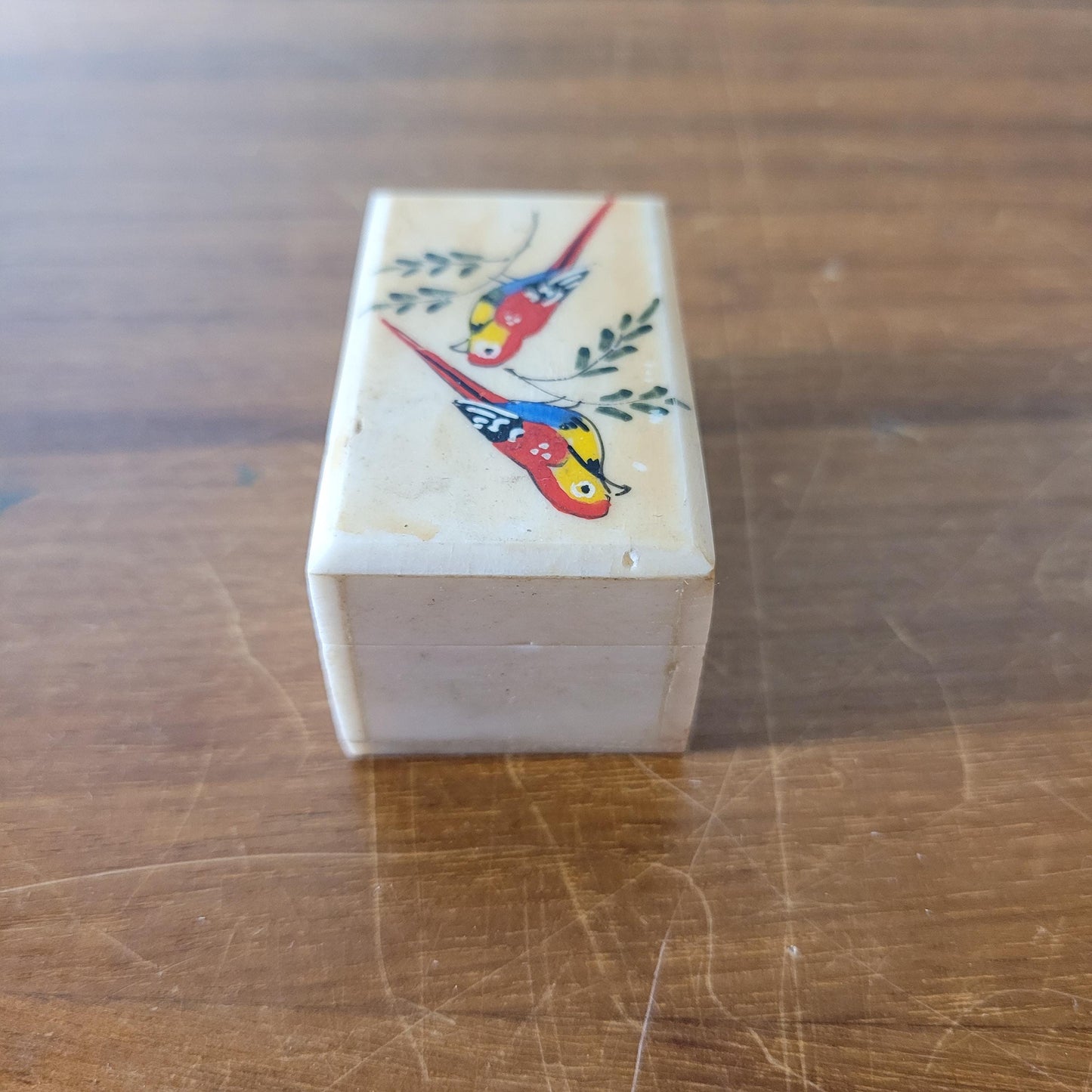 Vintage miniature hand-crafted bone trinket box with hand painted birds detail