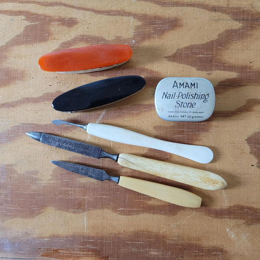 Assorted vintage bone and Bakelite manicure tools