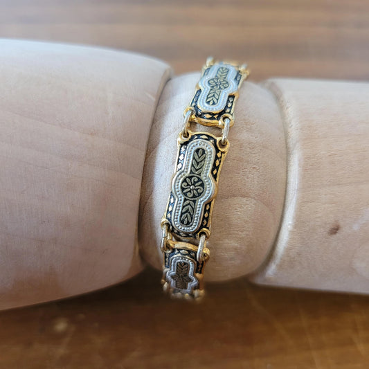 Vintage Damascene silver & gold-tone link bracelet with safety chain.