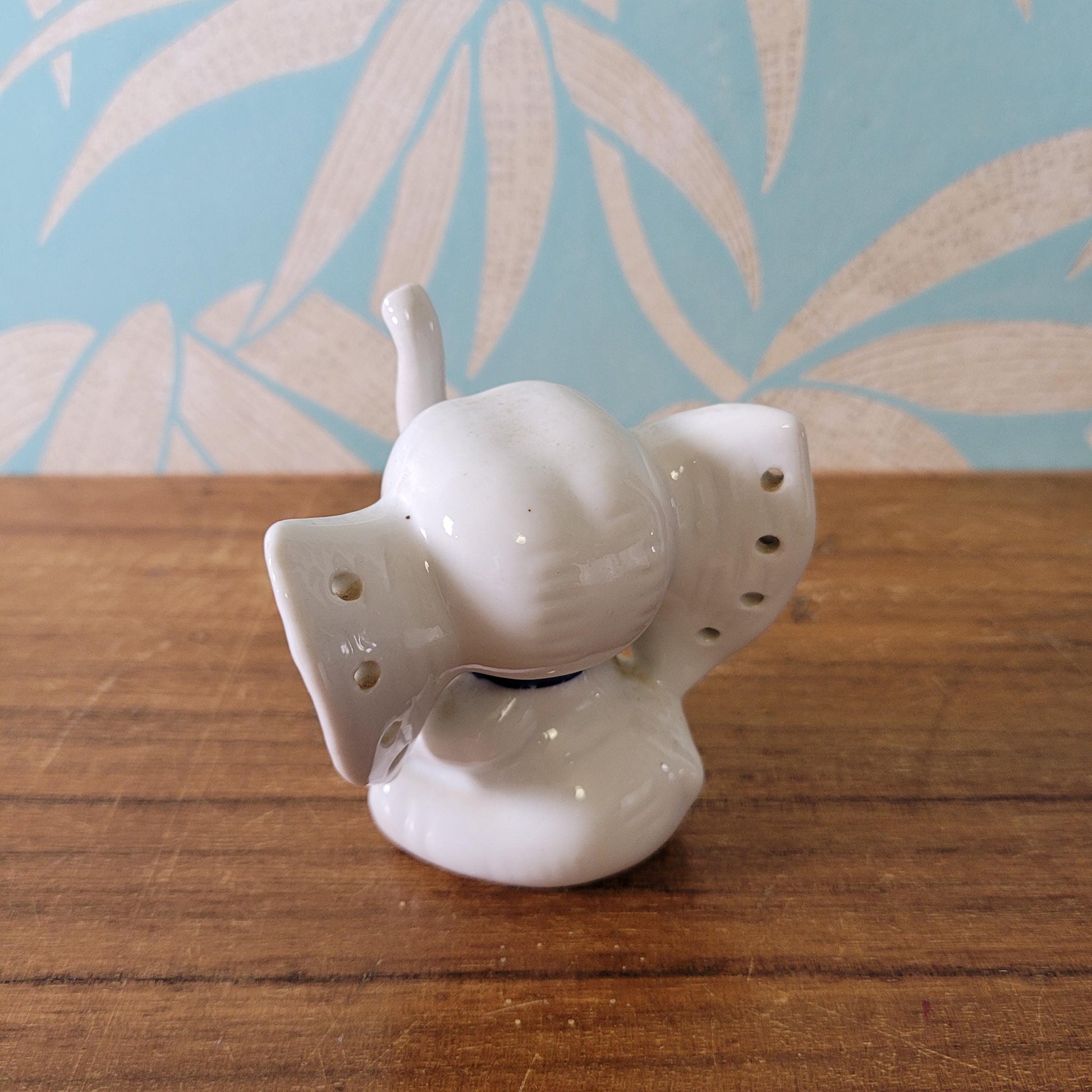 1970s WOOLBRO ceramic elephant earring holder, dark blue collar