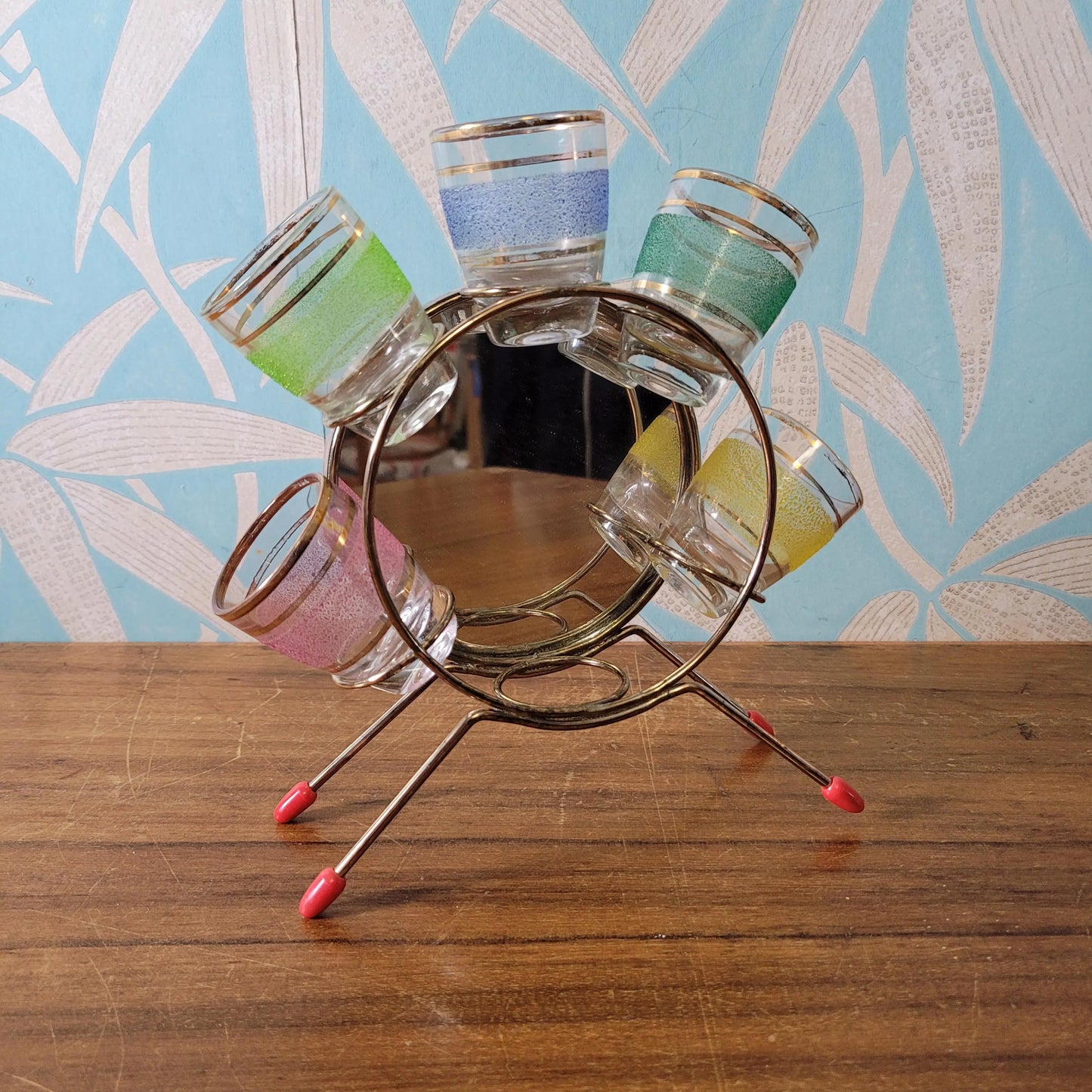 Mid-century mirrored wheel cocktail glass stand with ball feet (no glasses)