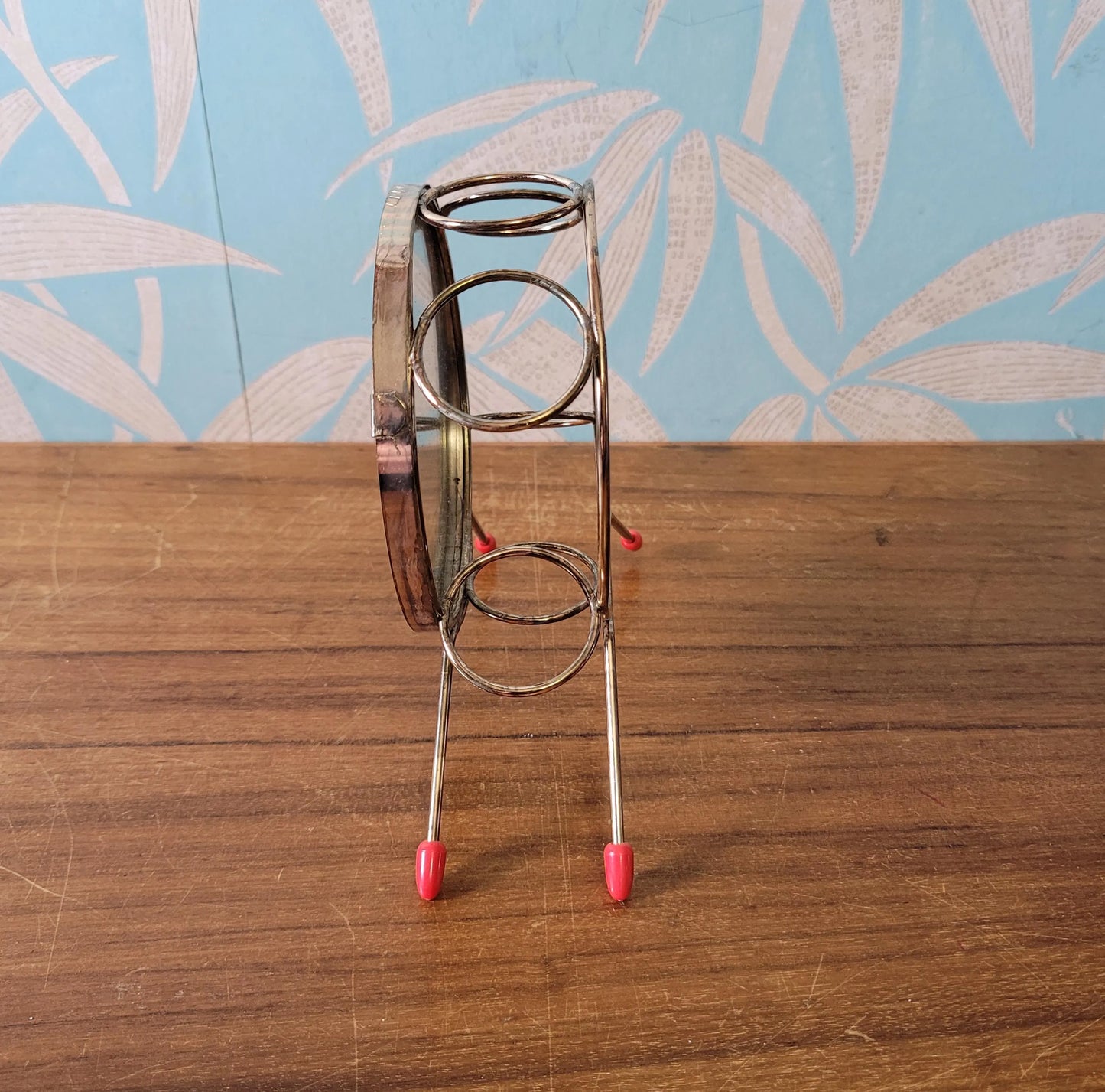 Mid-century mirrored wheel cocktail glass stand with ball feet (no glasses)