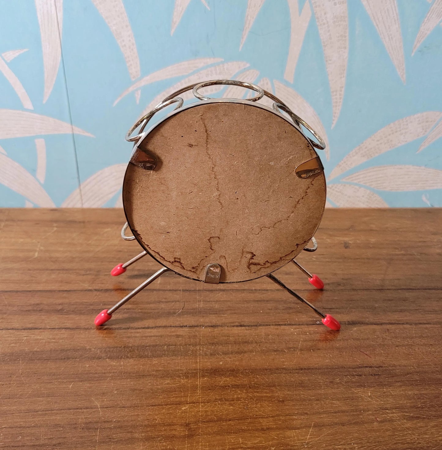 Mid-century mirrored wheel cocktail glass stand with ball feet (no glasses)