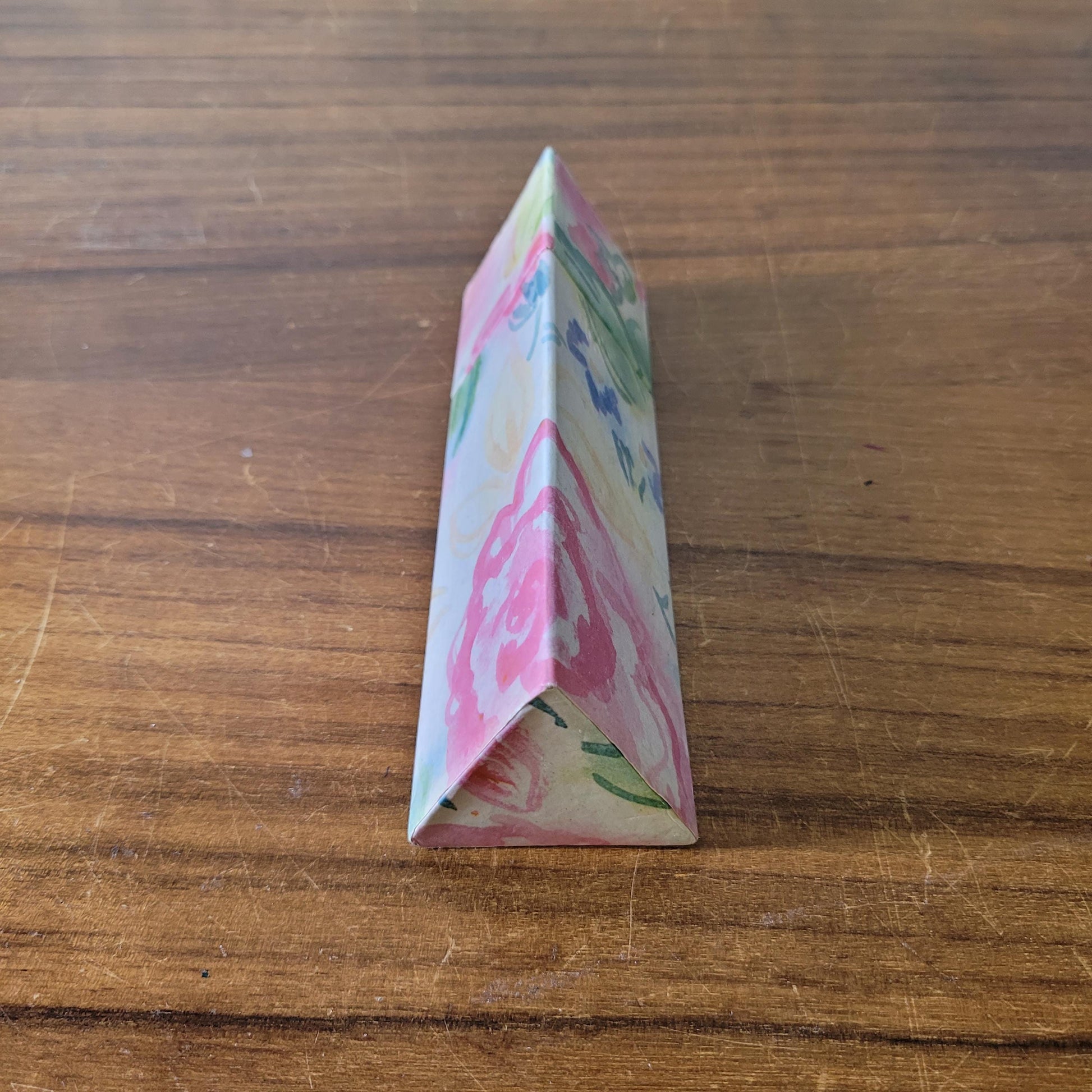 1980s Two's Company triangular floral print box containing 18 unused graphite pencils