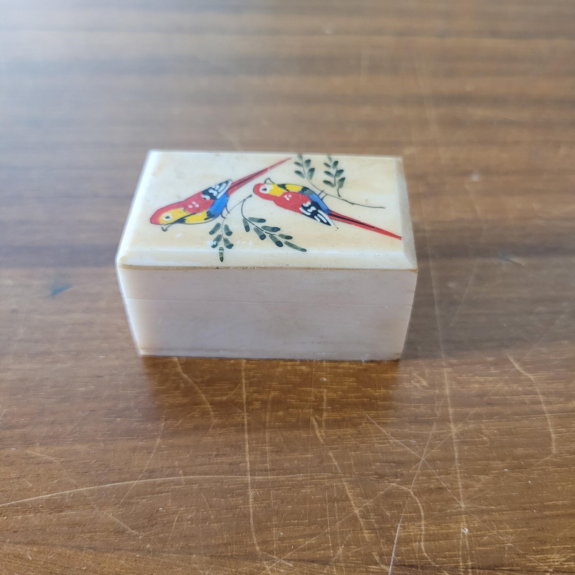 Vintage miniature hand-crafted bone trinket box with hand painted birds detail