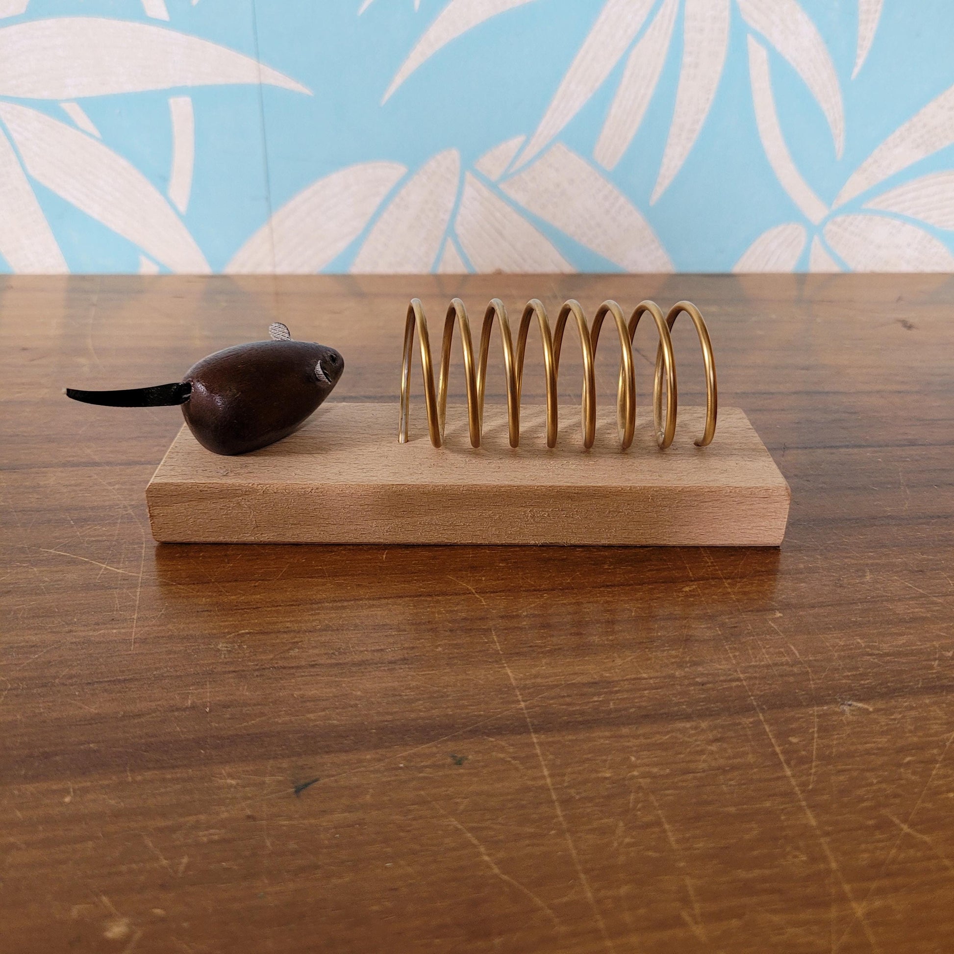 Vintage gold-tone spiral & wood letter rack with teak mouse addition