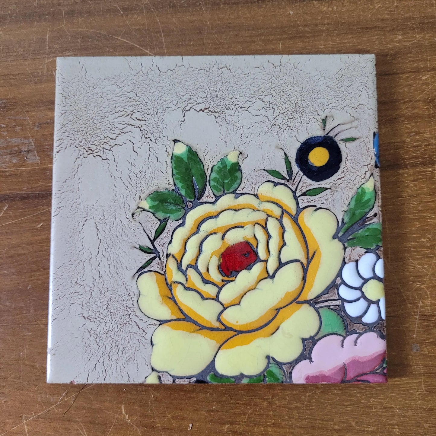 Set of four 1970s floral tiles, made in Spain