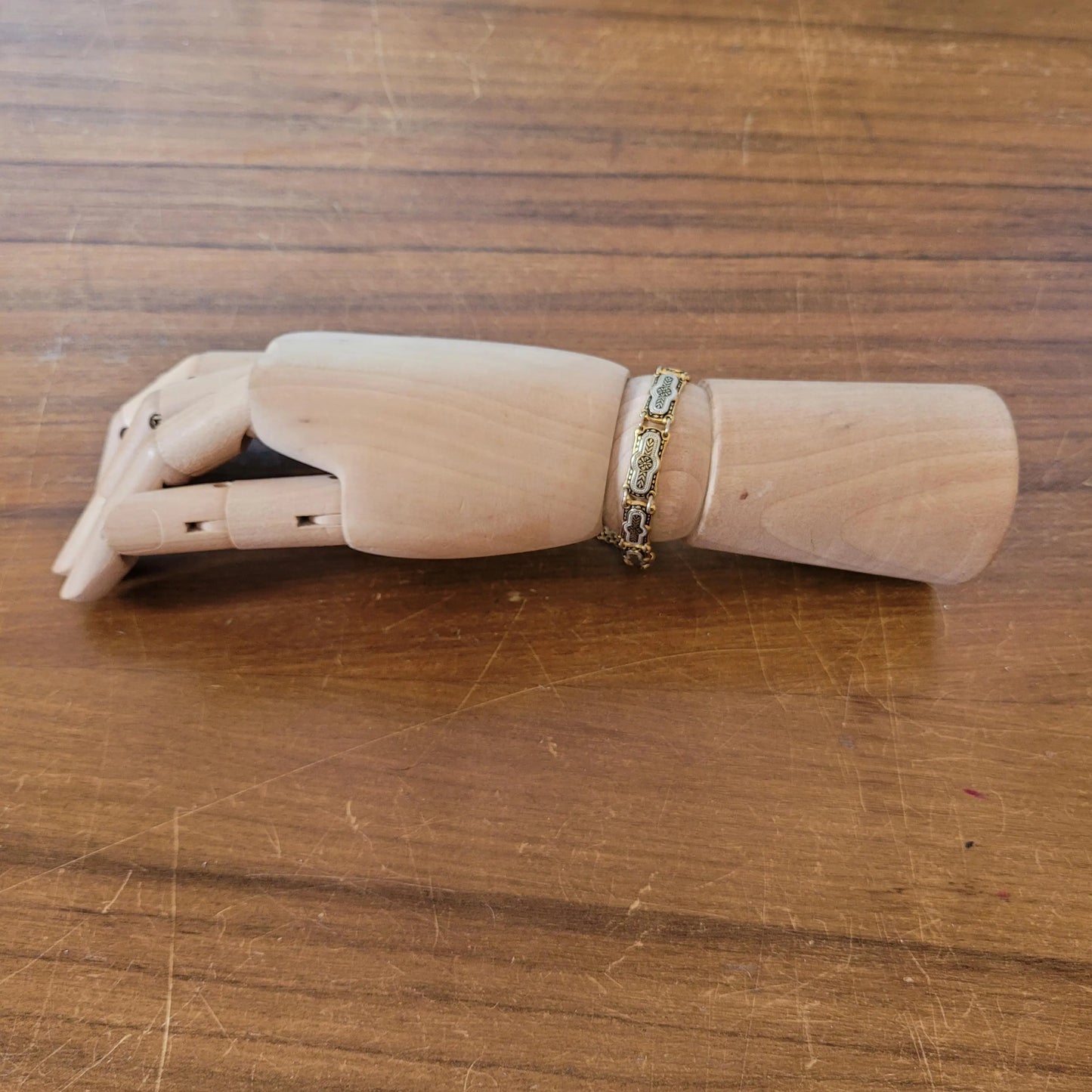 Vintage Damascene silver & gold-tone link bracelet with safety chain.