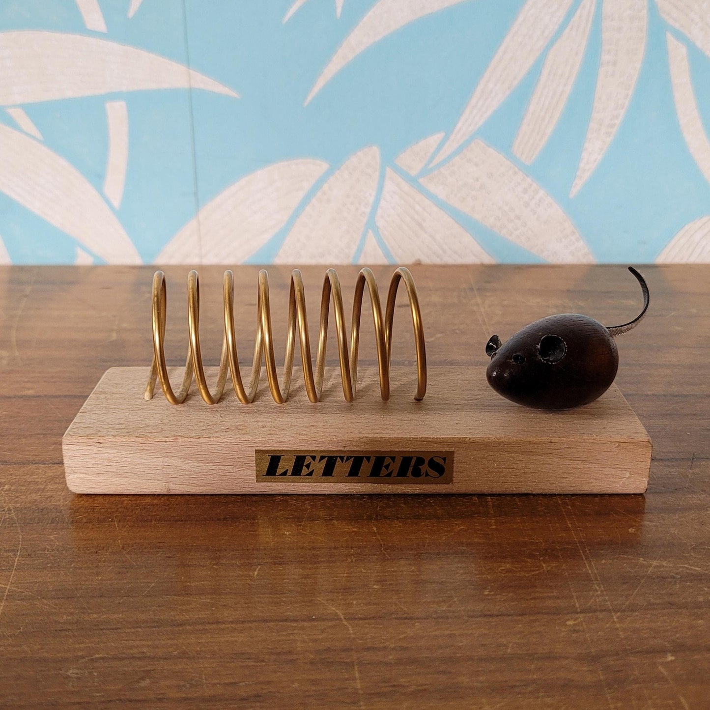 Vintage gold-tone spiral & wood letter rack with teak mouse addition