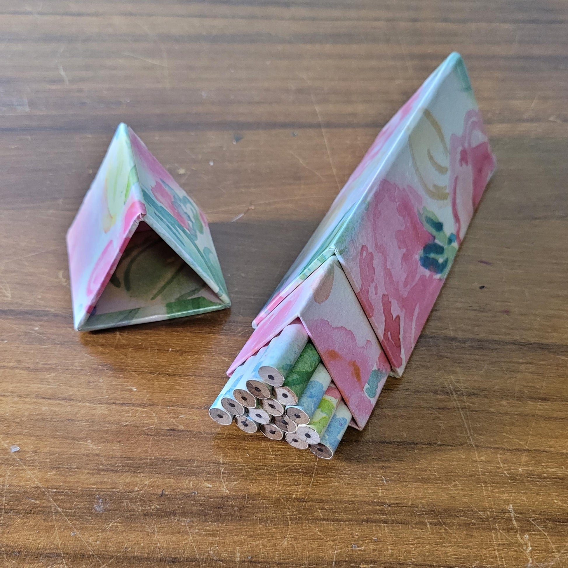 1980s Two's Company triangular floral print box containing 18 unused graphite pencils
