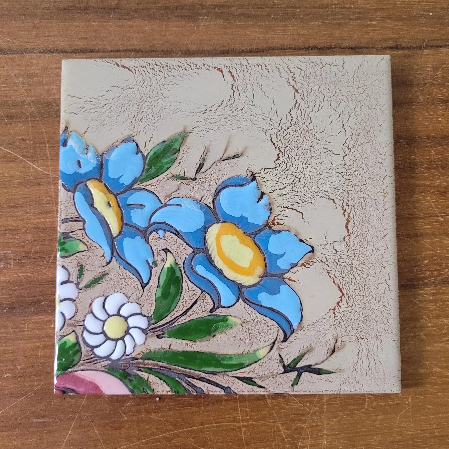 Set of four 1970s floral tiles, made in Spain