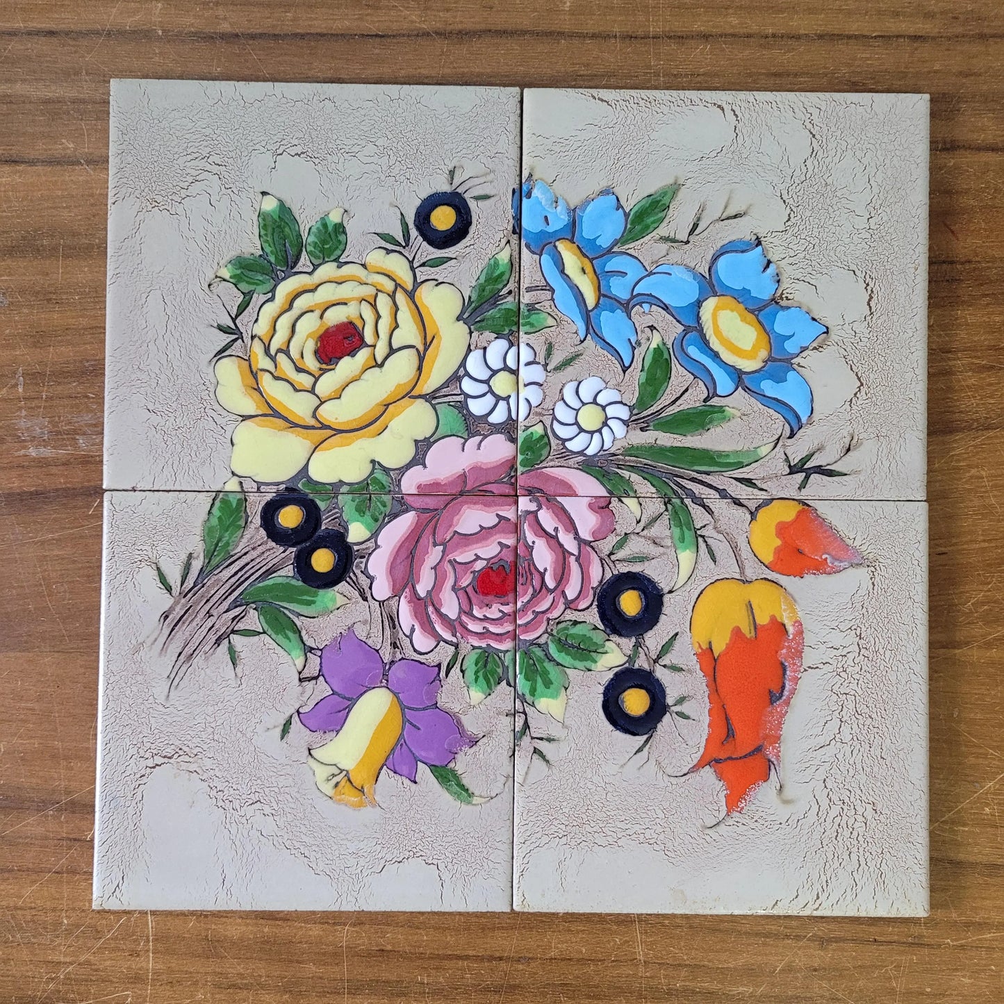 Set of four 1970s floral tiles, made in Spain