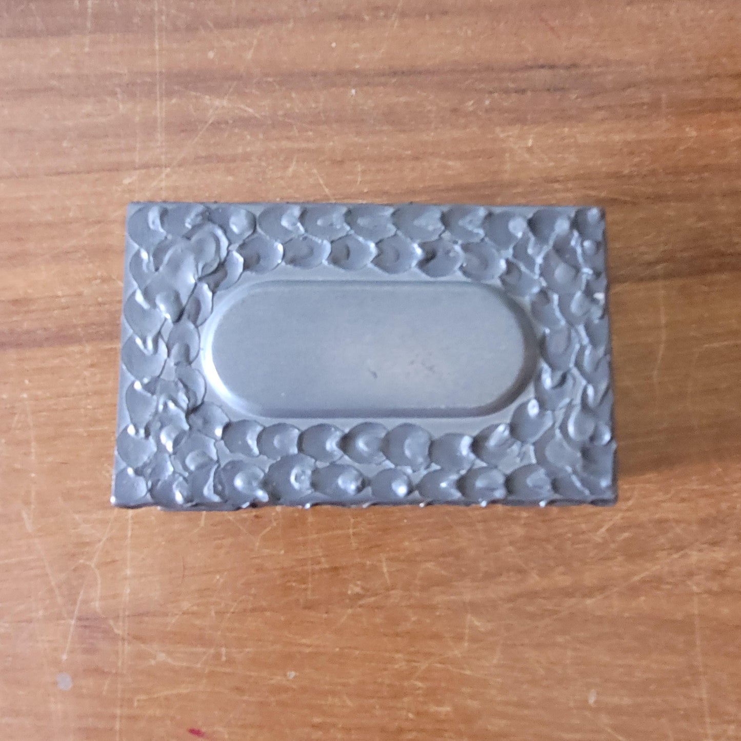 circa. 1960s Perletinn, Norway, hammered pewter matchbox cover