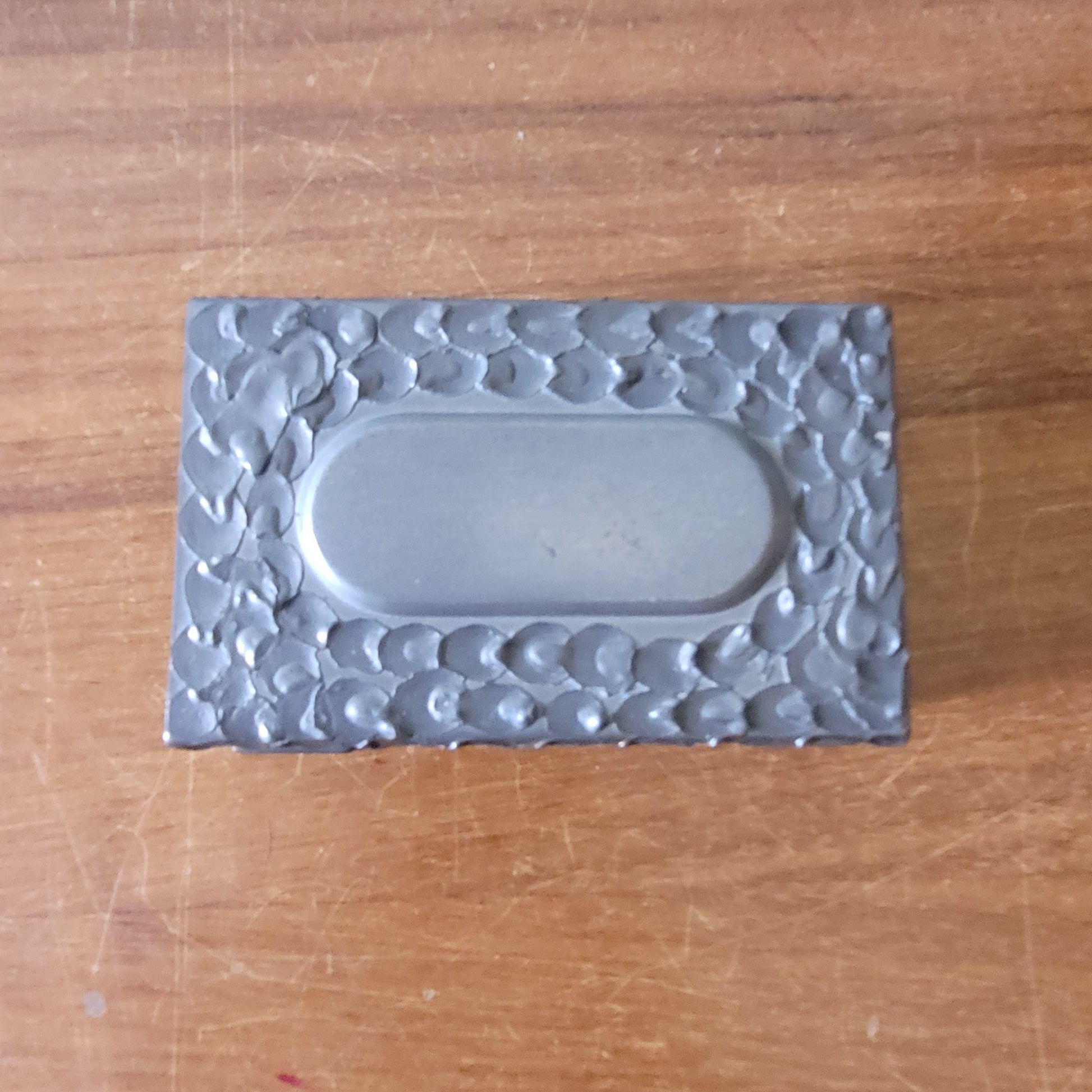 circa. 1960s Perletinn, Norway, hammered pewter matchbox cover