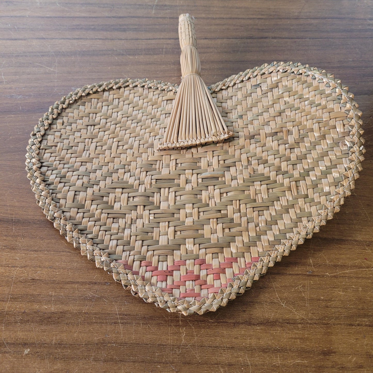 Vintage 1970s-style woven pandanus hand fan