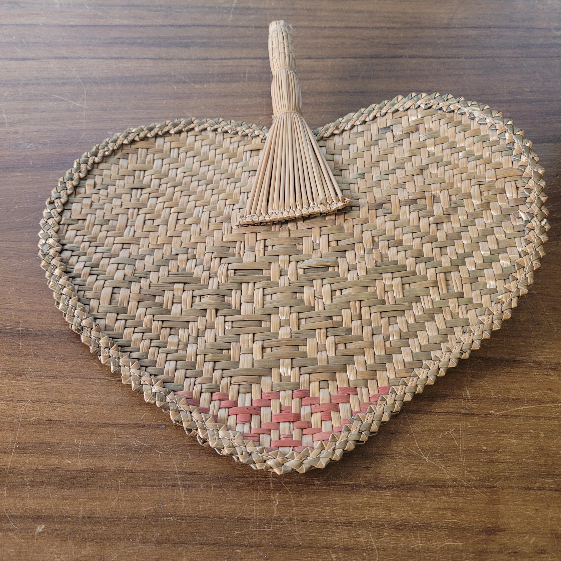 Vintage 1970s-style woven pandanus hand fan