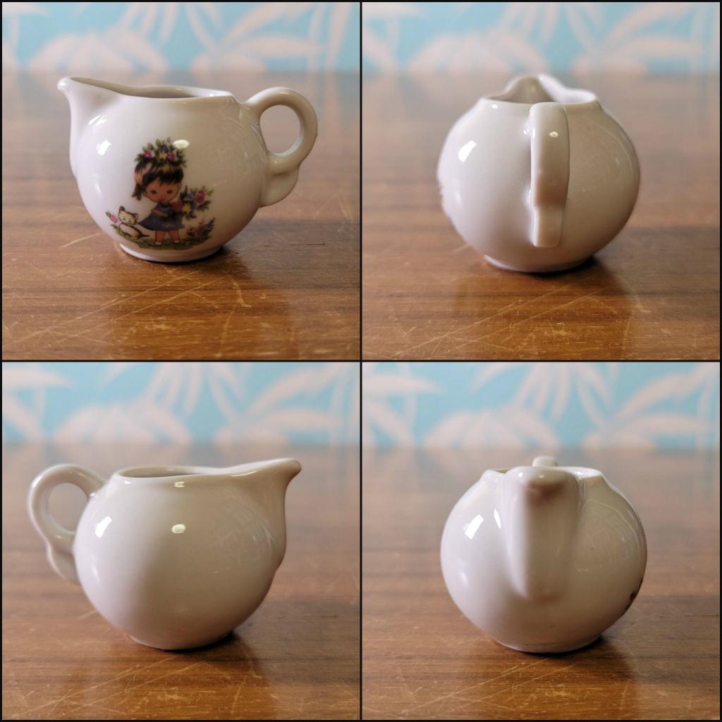 1960s children's china teaset, illustrated with girl and kitten