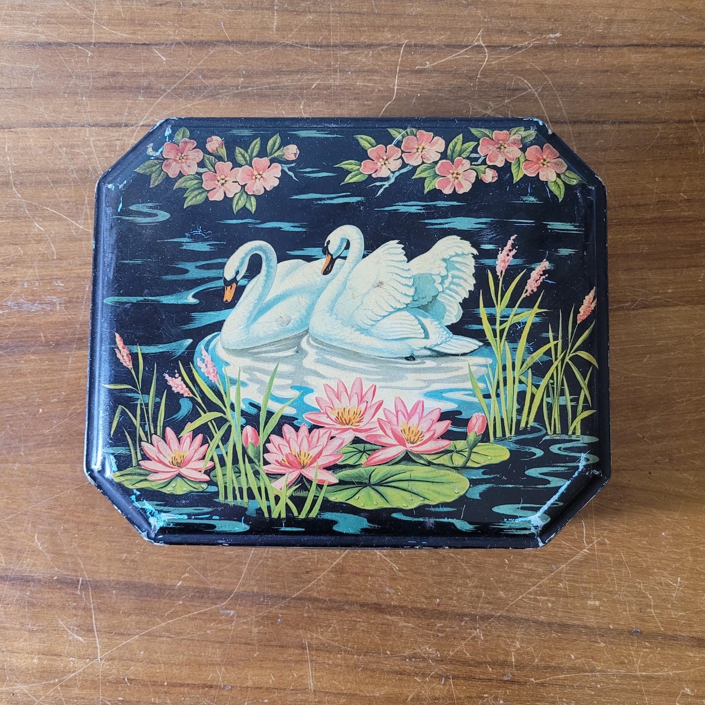 circa. 1950s Burtons Gold tin biscuit box depicting two swans swimming amongst lily pads