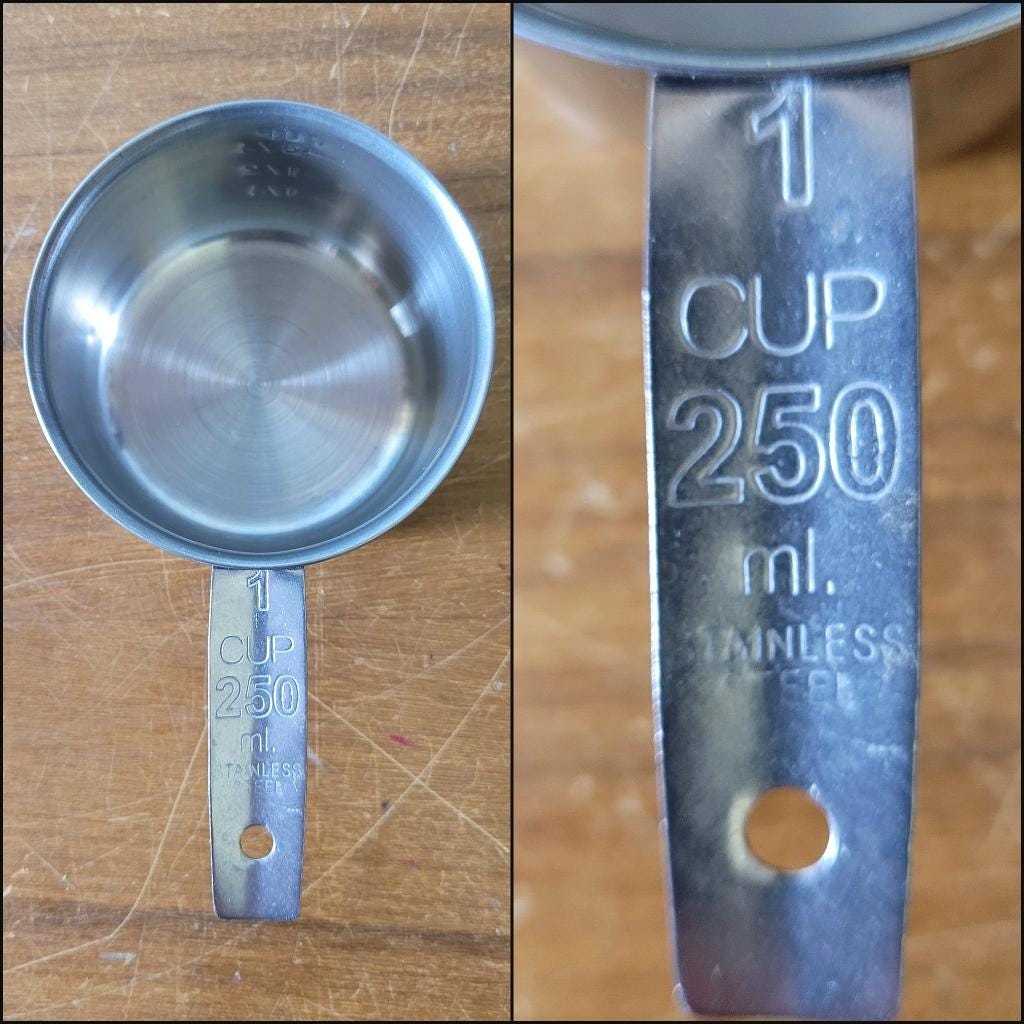Set of four 1970s stainless steel measuring cups