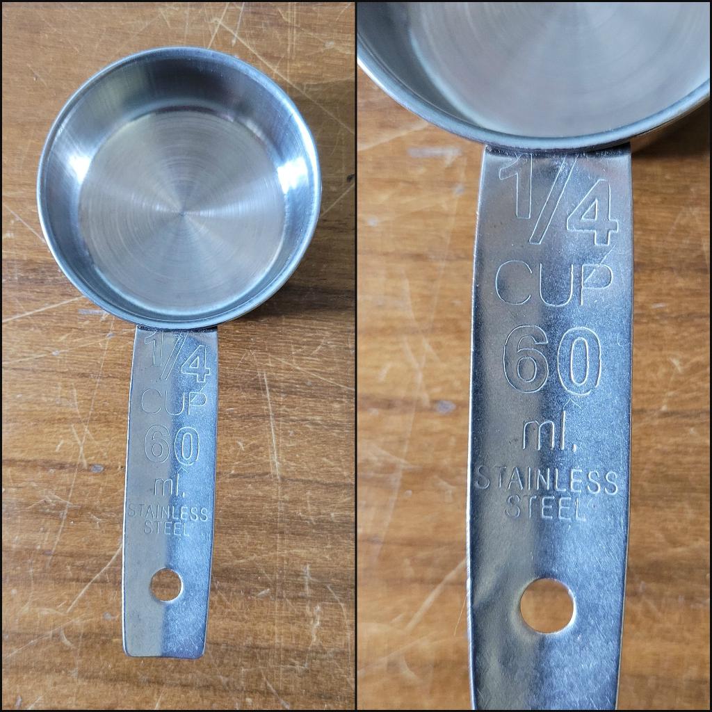 Set of four 1970s stainless steel measuring cups