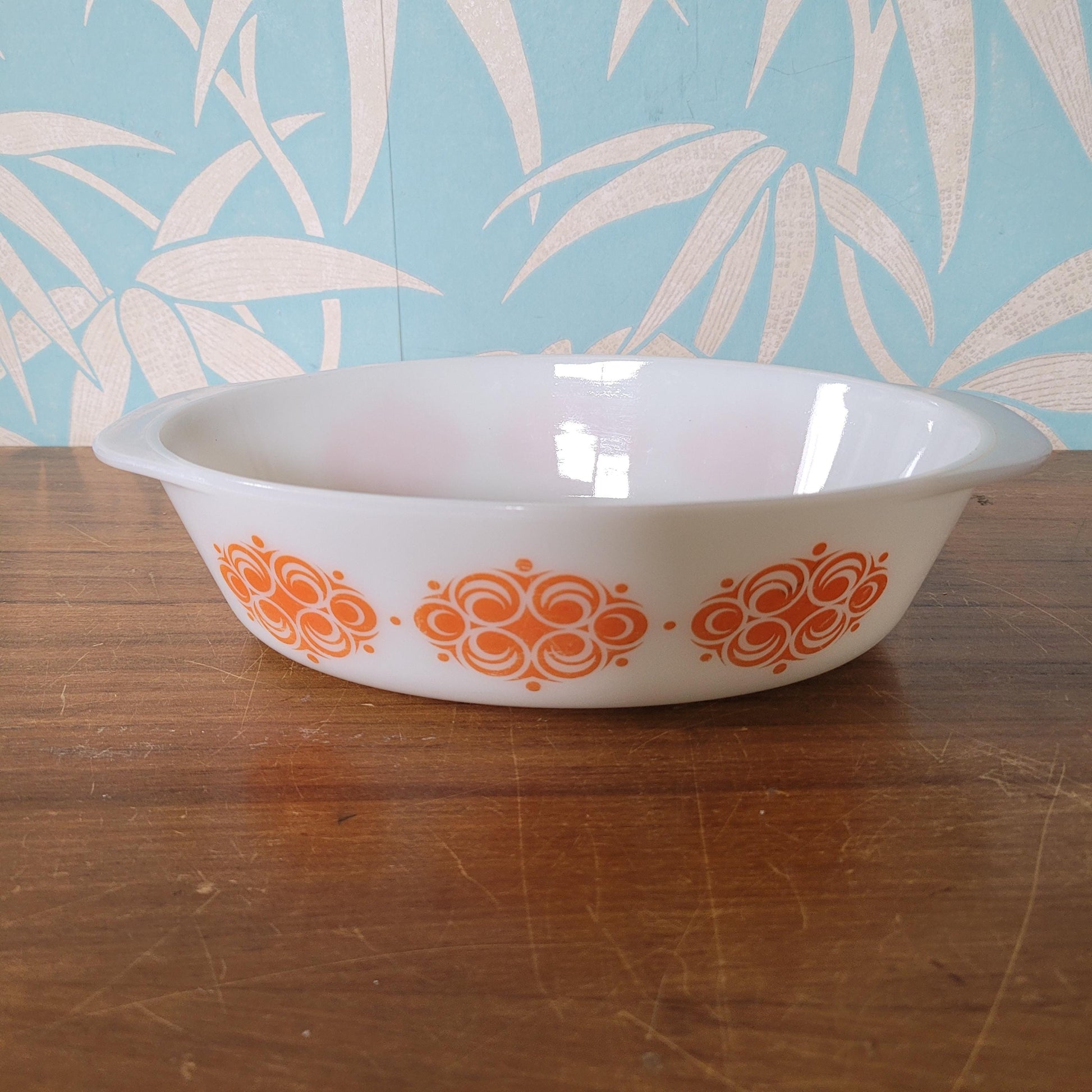 1970s geometric orange pattern Agee Pyrex casserole dish
