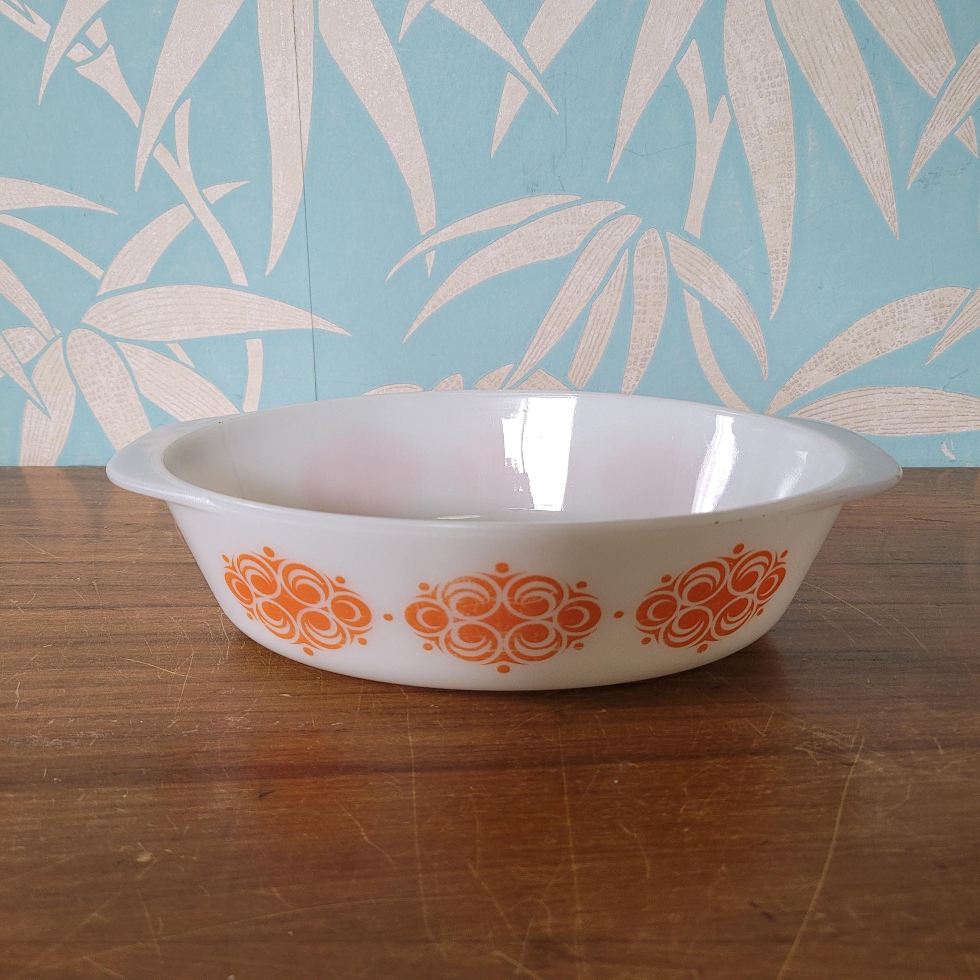 1970s geometric orange pattern Agee Pyrex casserole dish