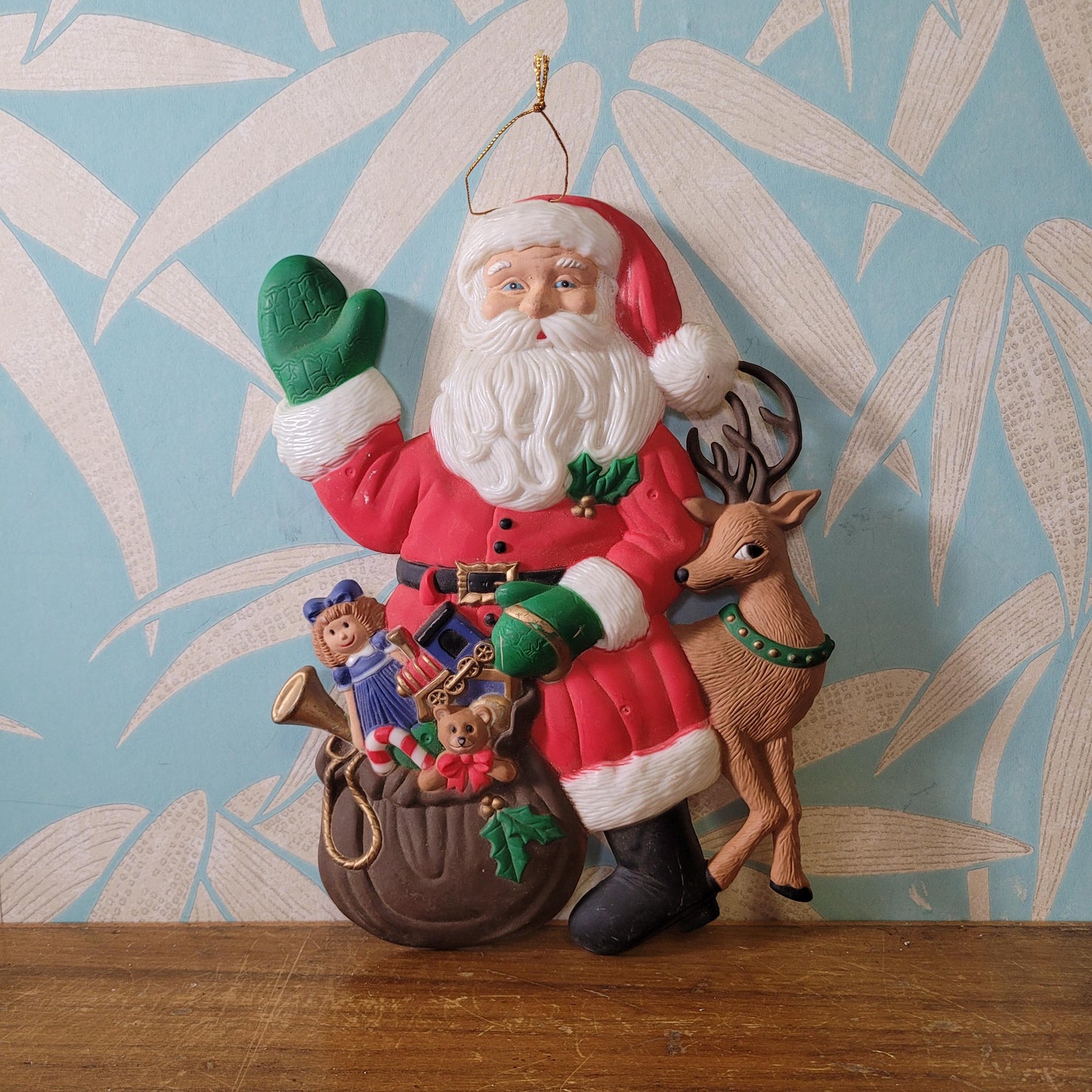 Vintage plastic Santa with toy sack & reindeer wall hanging