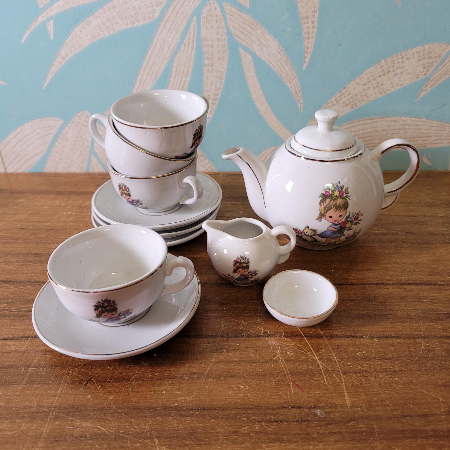 1960s children's china teaset, illustrated with girl and kitten