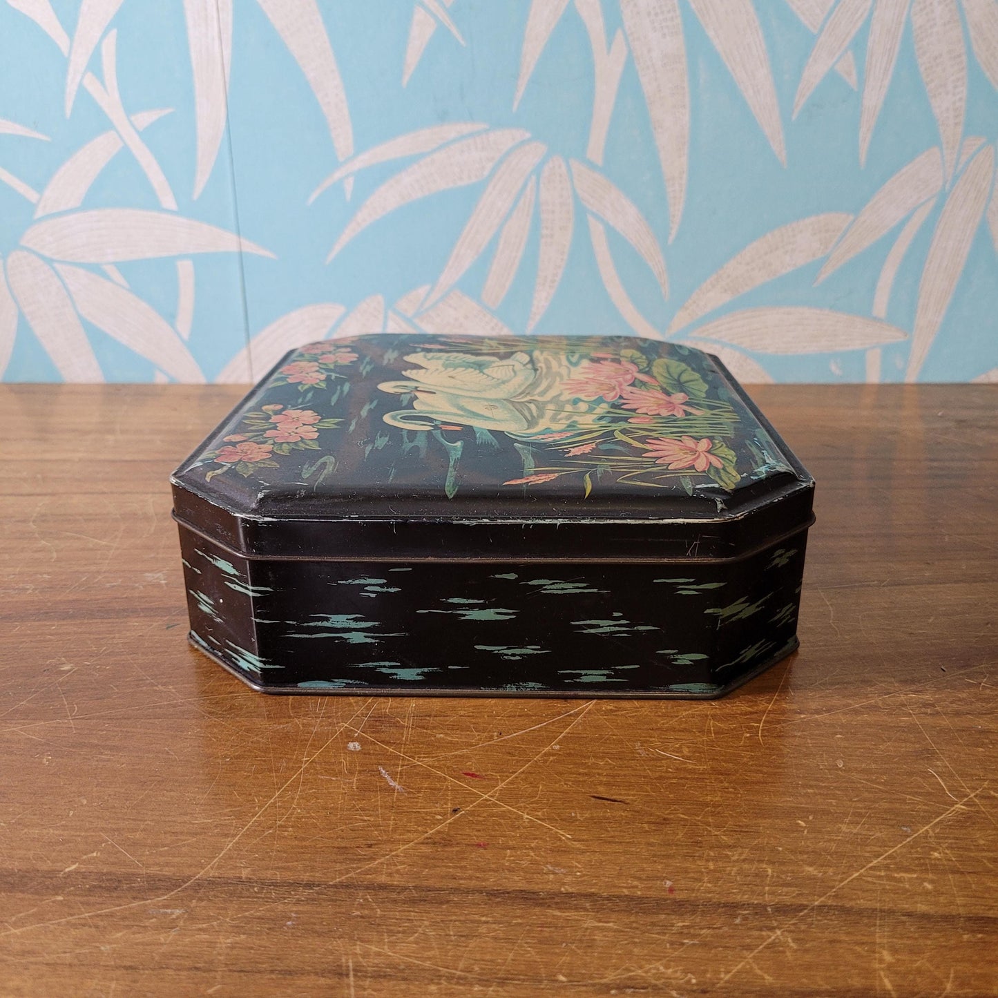 circa. 1950s Burtons Gold tin biscuit box depicting two swans swimming amongst lily pads