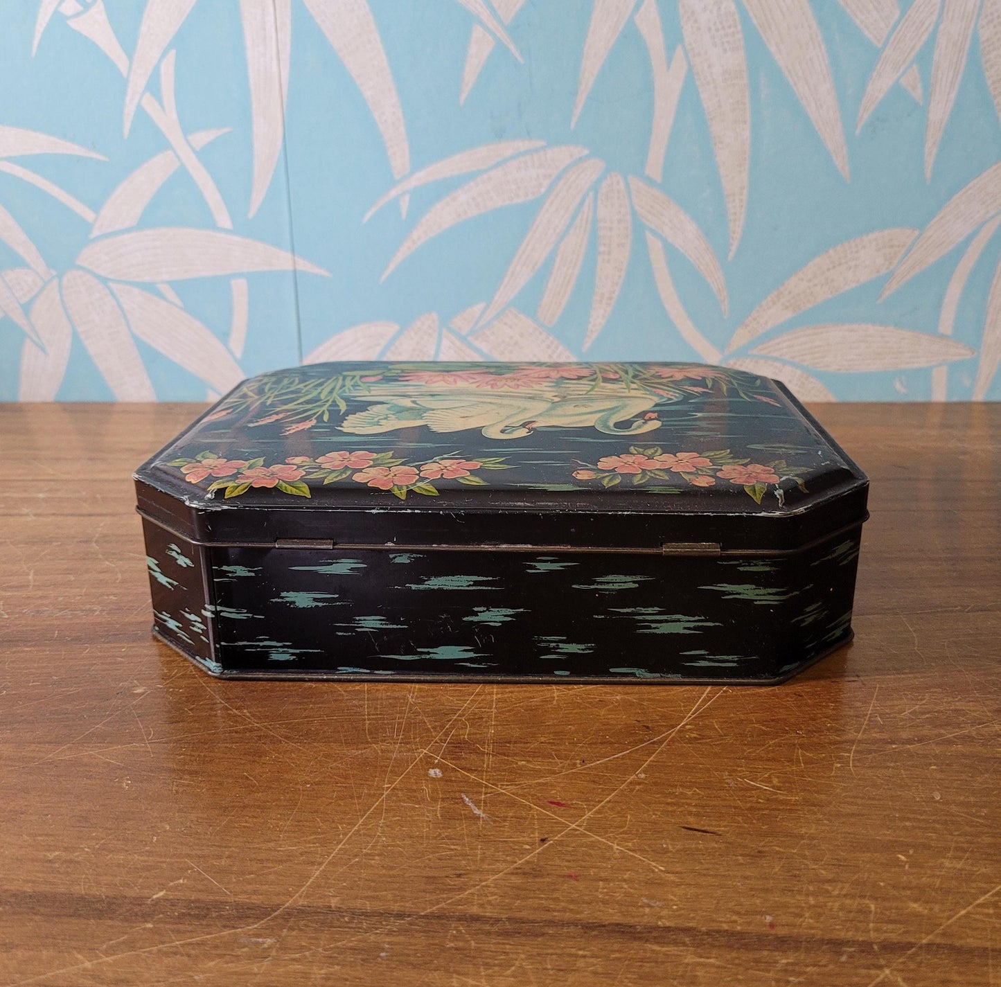 circa. 1950s Burtons Gold tin biscuit box depicting two swans swimming amongst lily pads