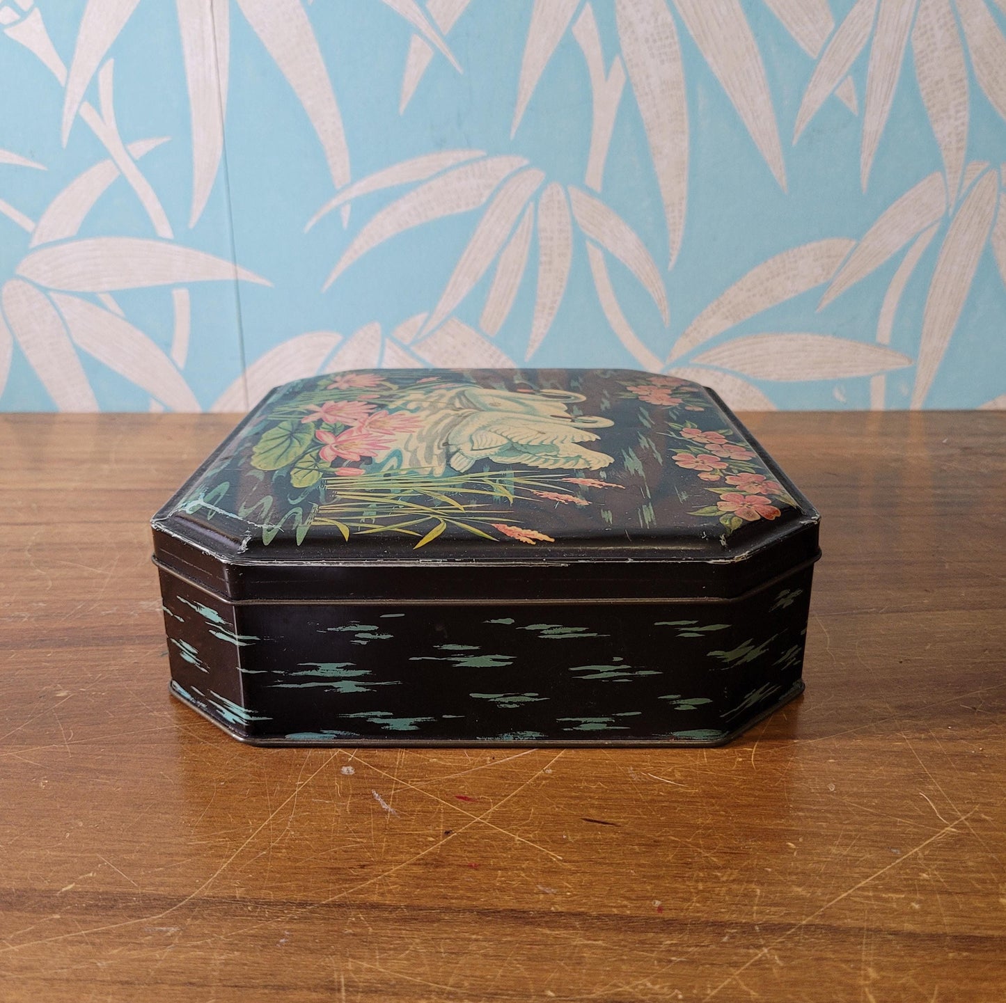 circa. 1950s Burtons Gold tin biscuit box depicting two swans swimming amongst lily pads