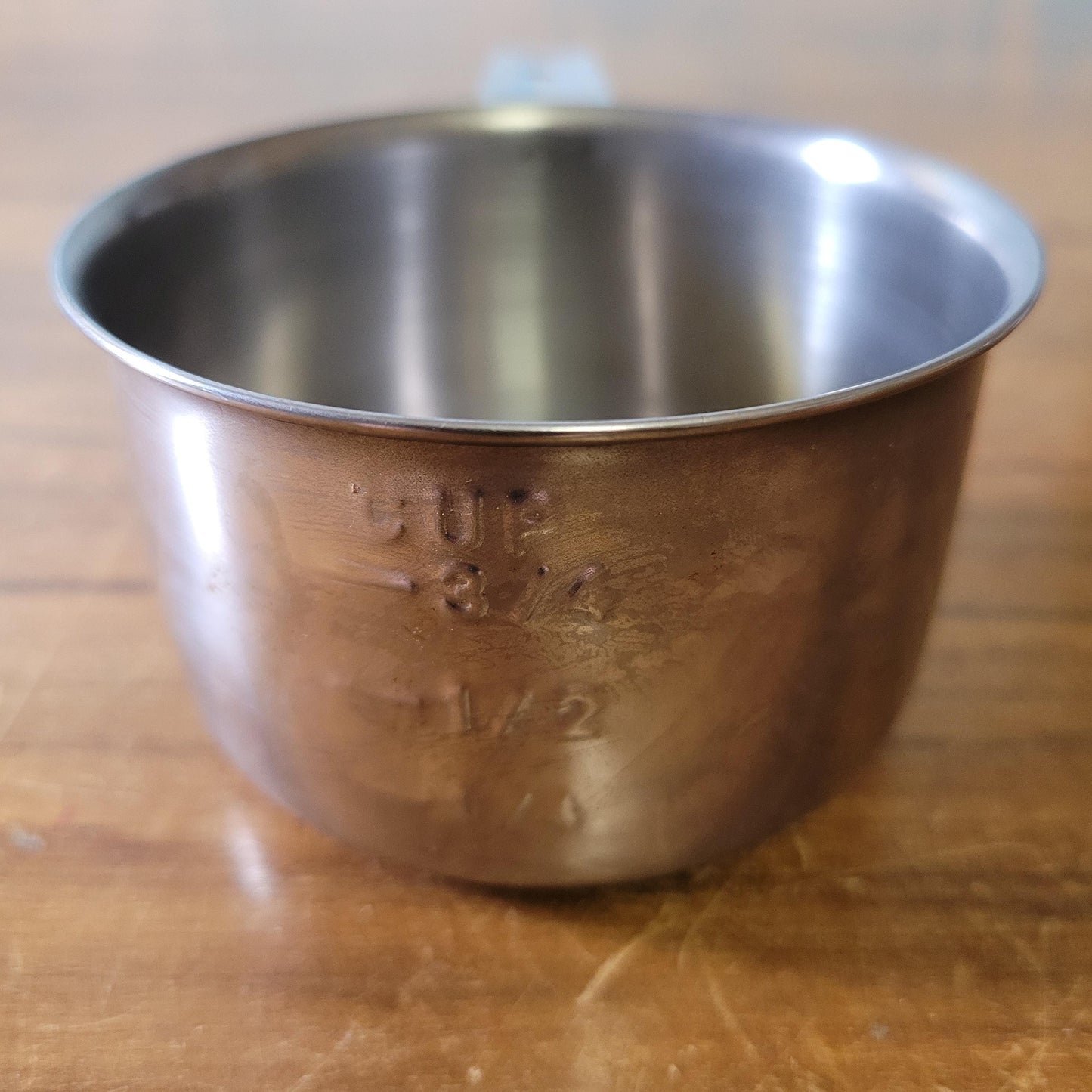 Set of four 1970s stainless steel measuring cups