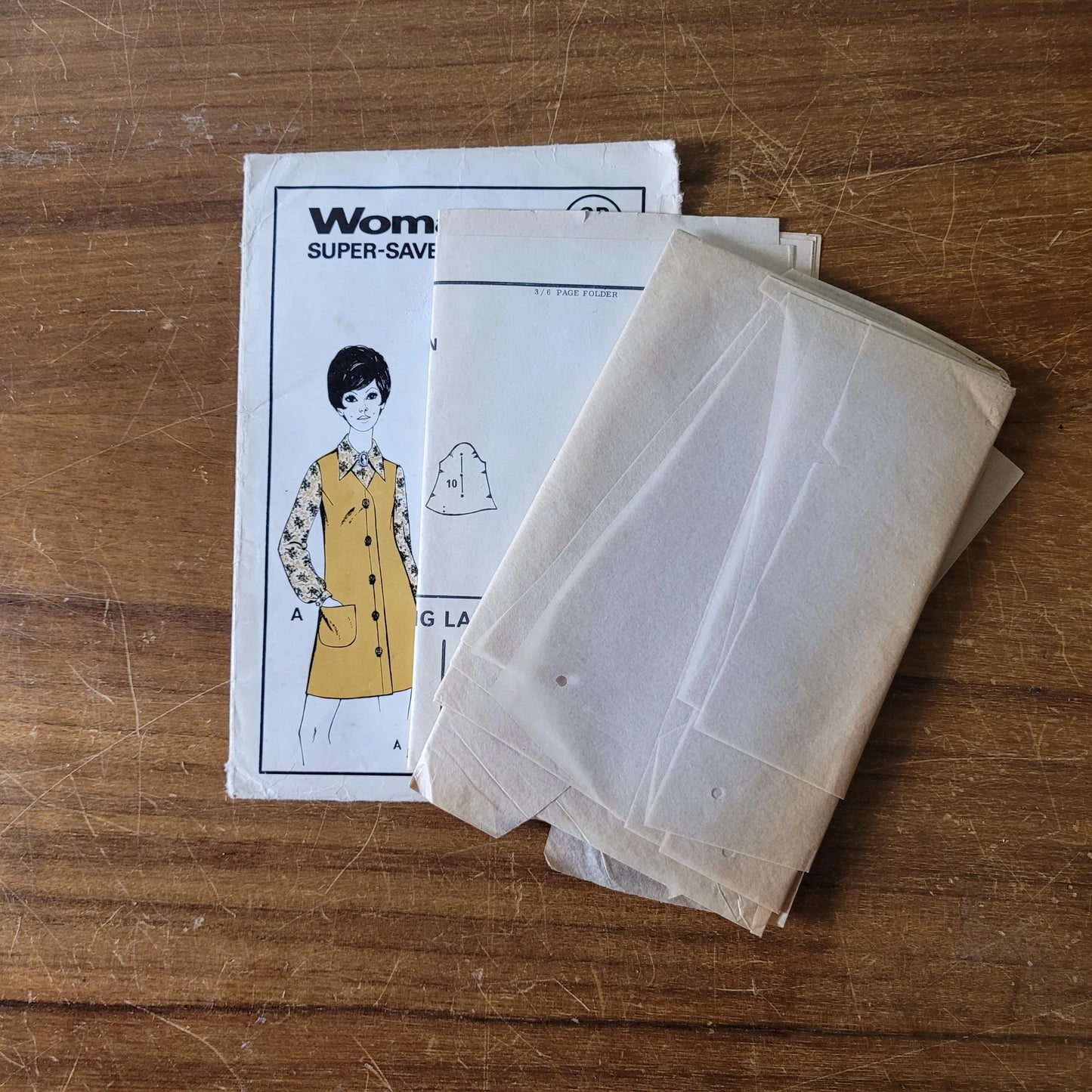 Uncut 1960s Woman SP2 sewing pattern for blouse & pinafore dress, size 12 (complete)