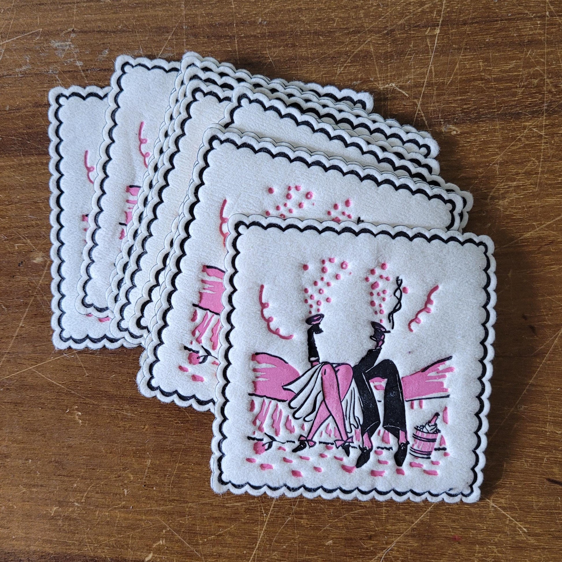 Set of ten 1960s paper cocktail mats/coasters