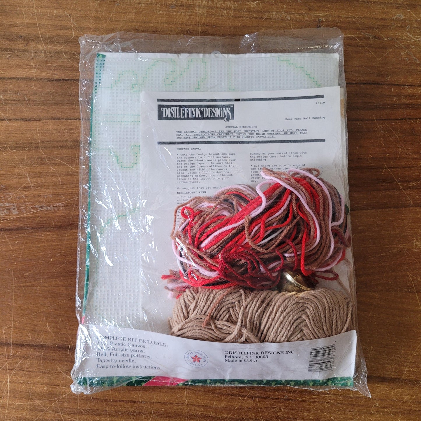 1990 Distlefink Designs plastic canvas reindeer wall hanging (part cut)